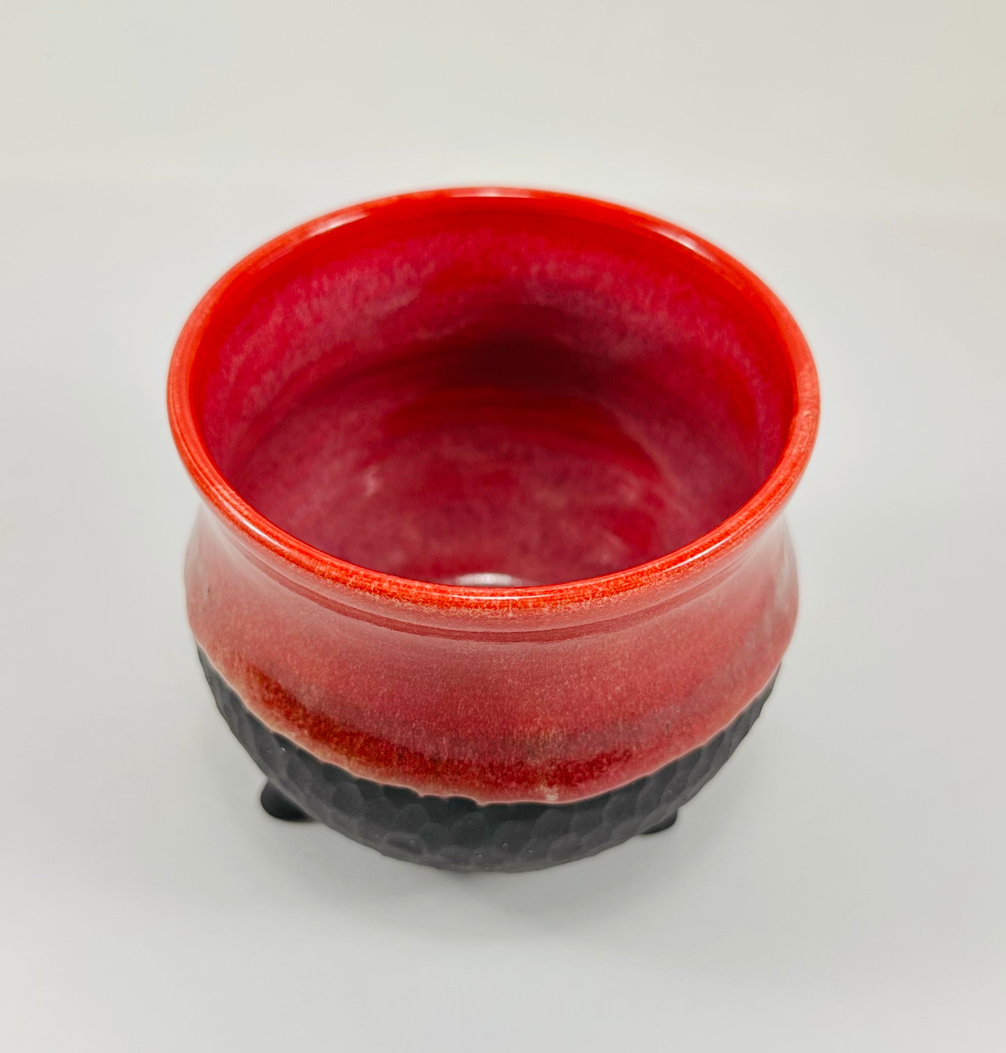 Handmade cauldron in a beautiful red and black glaze