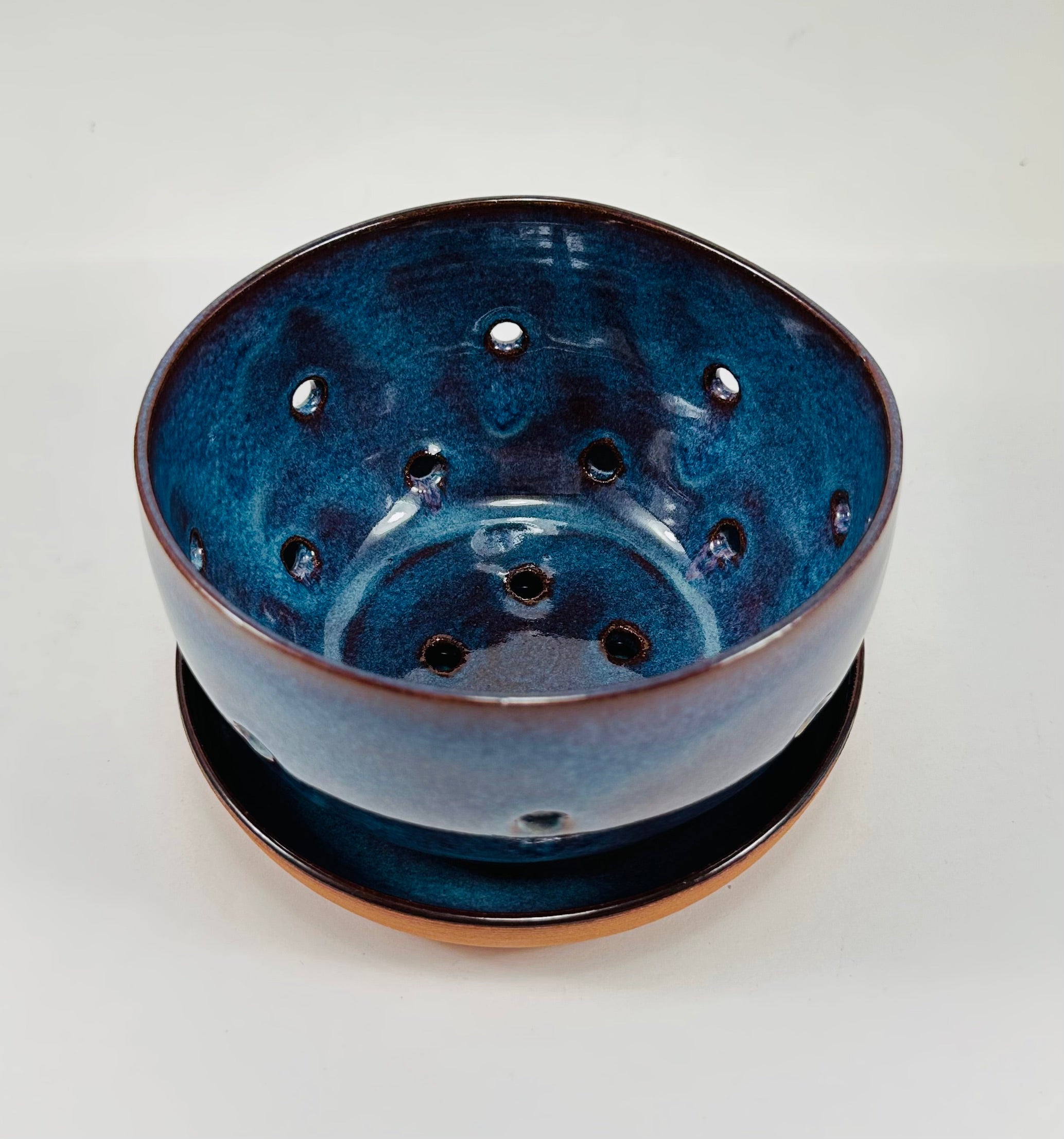 Handmade berry bowl in a beautiful blue glaze.