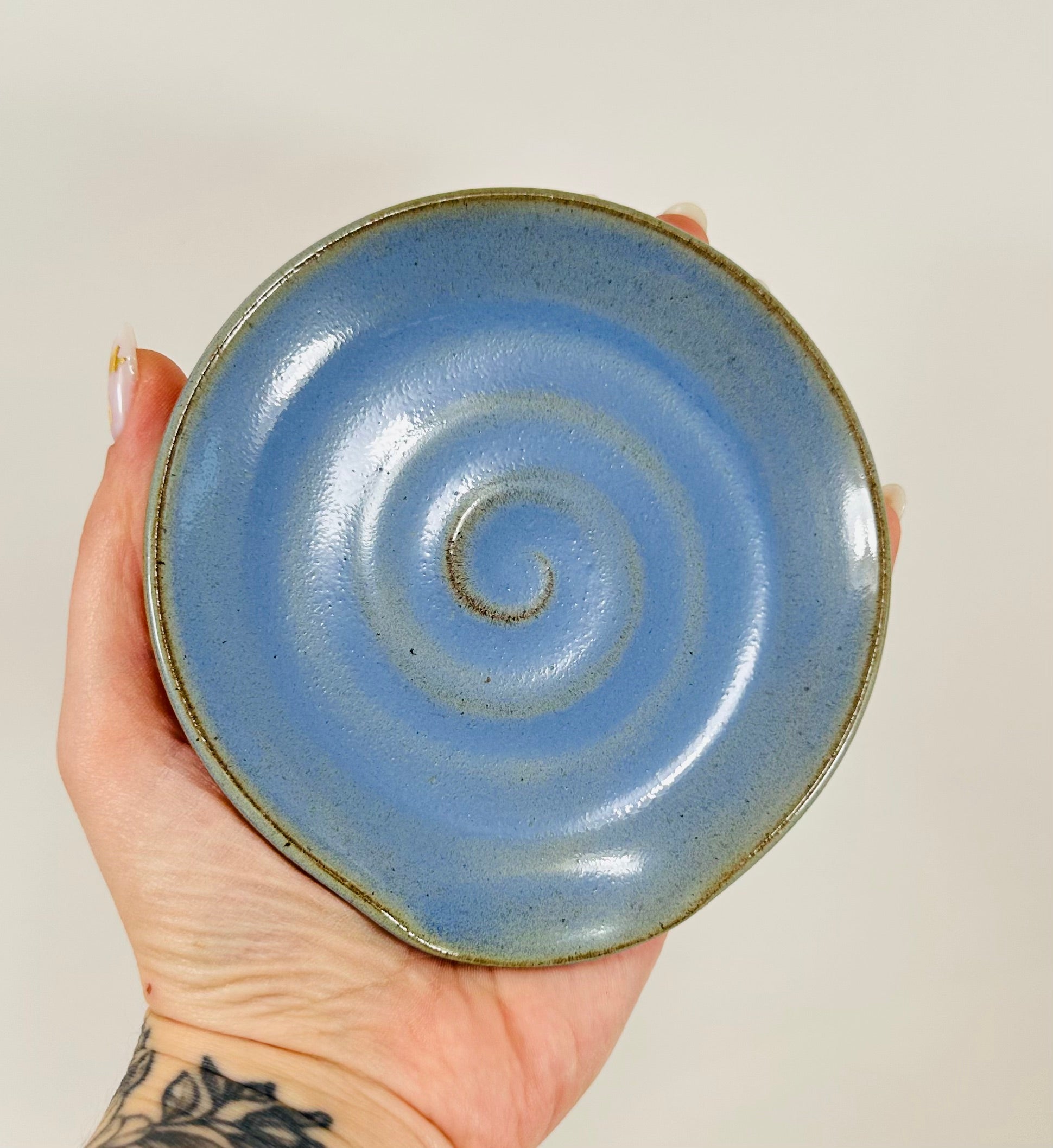Handmade spoon rest in a beautiful blue glaze.