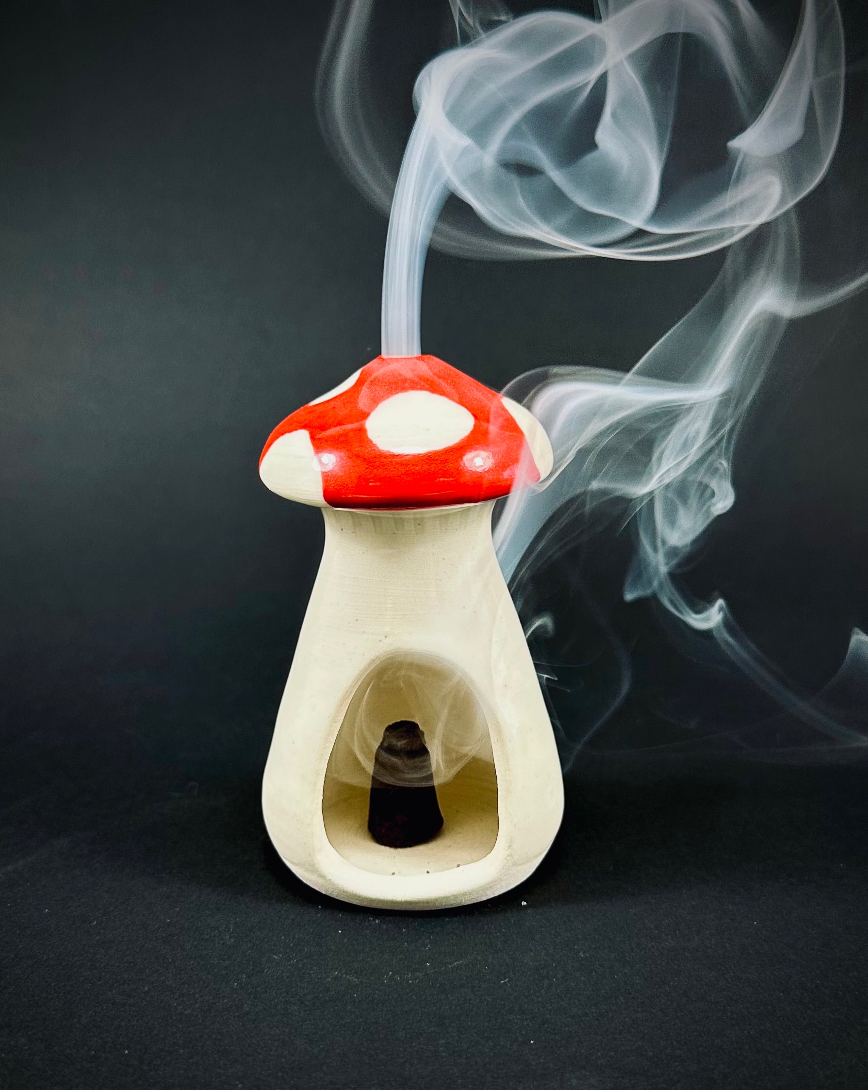 Handmade mushroom incense dome.