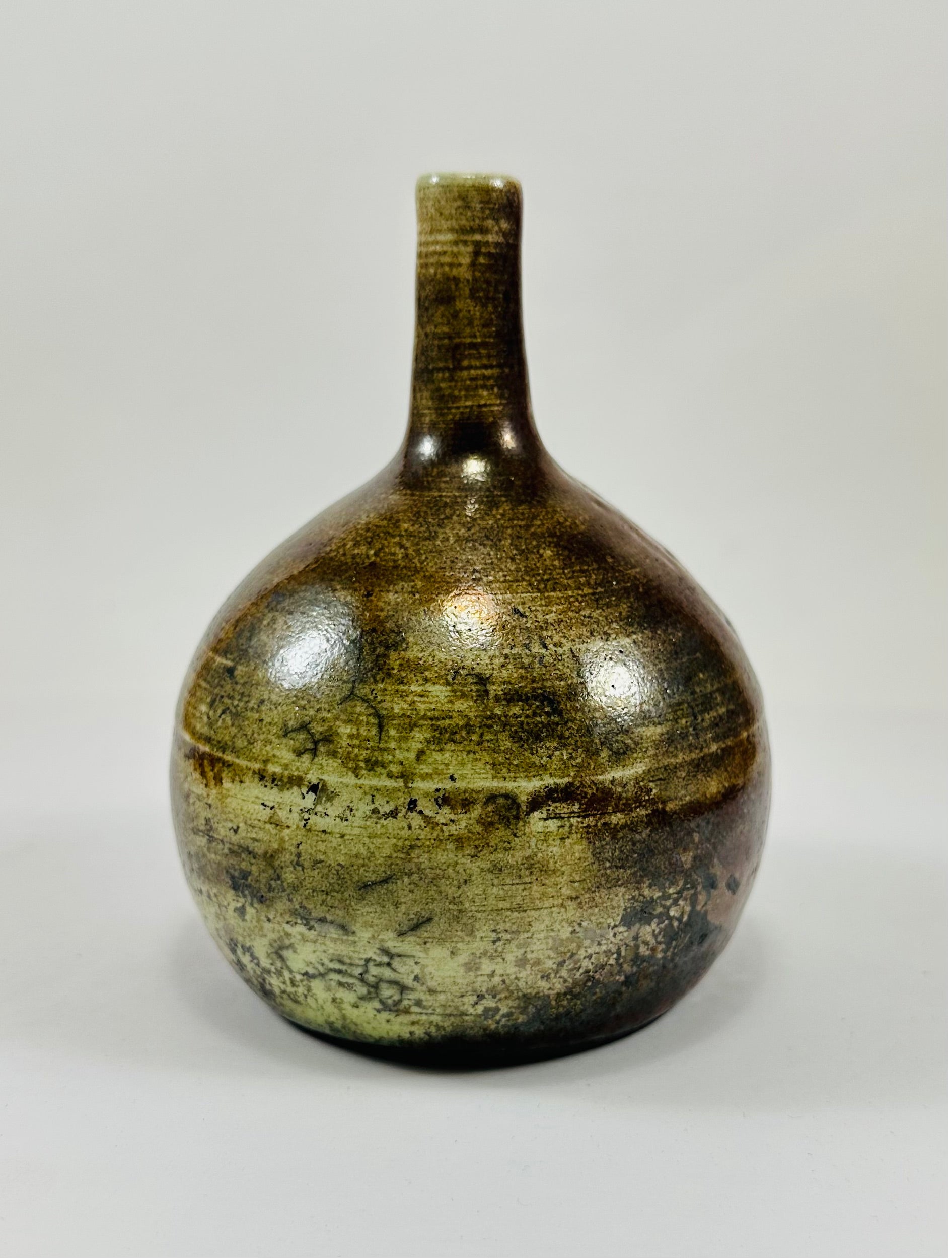 Handmade Raku vase in a beautiful yellow and red glaze.
