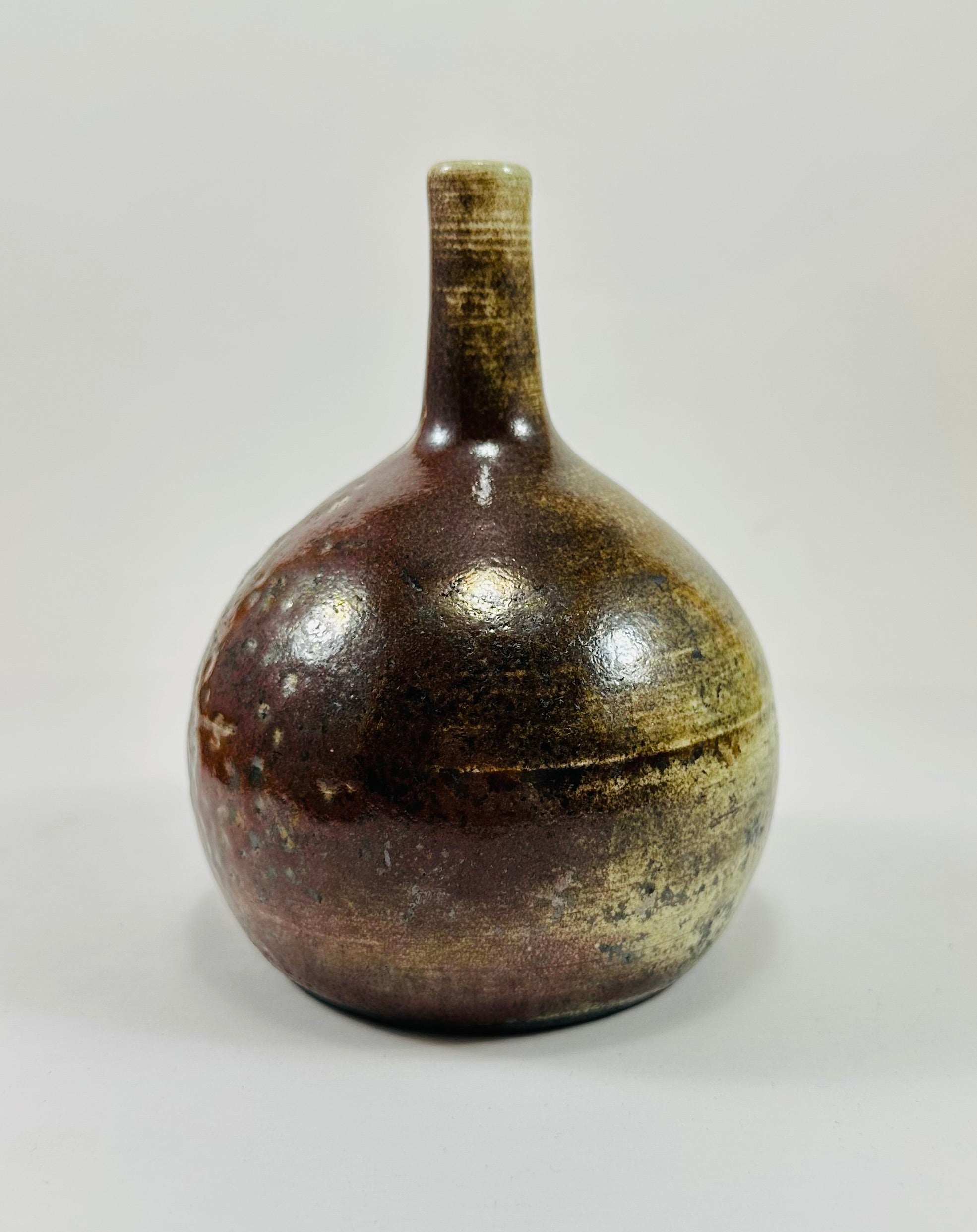 Handmade Raku vase in a beautiful yellow and red glaze.