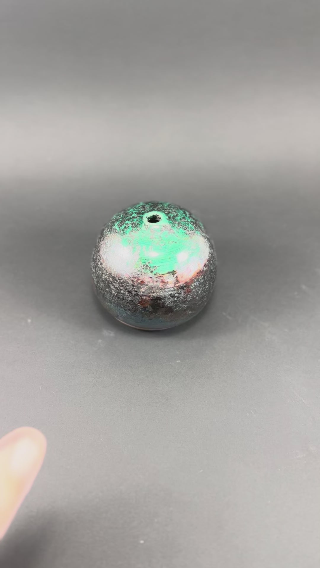 A Raku fired incense dome in a beautiful copper green glaze