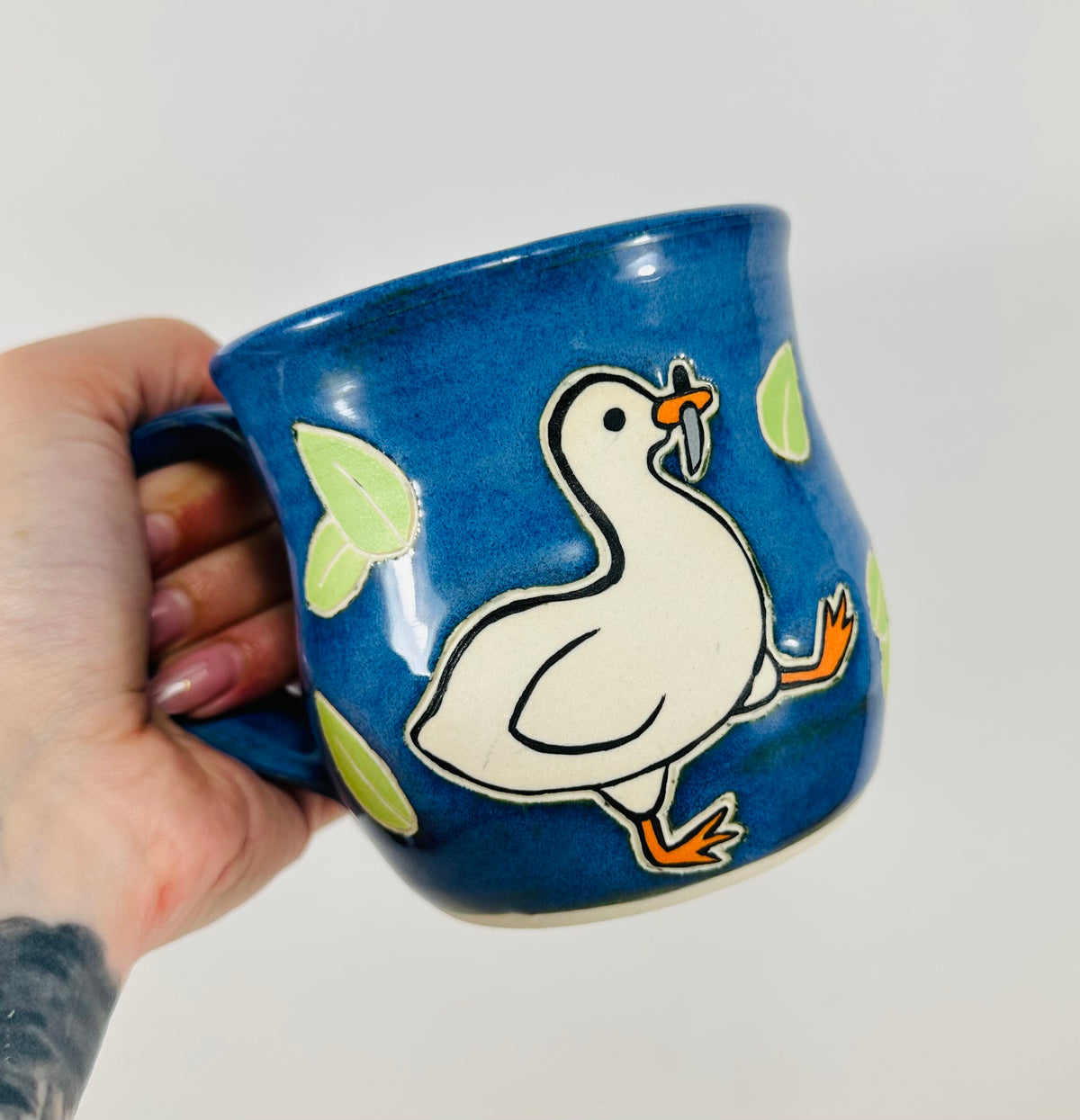 Goose With a Knife Mug