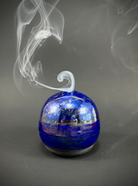 Raku fired incense dome in a beautiful blue/purple glaze