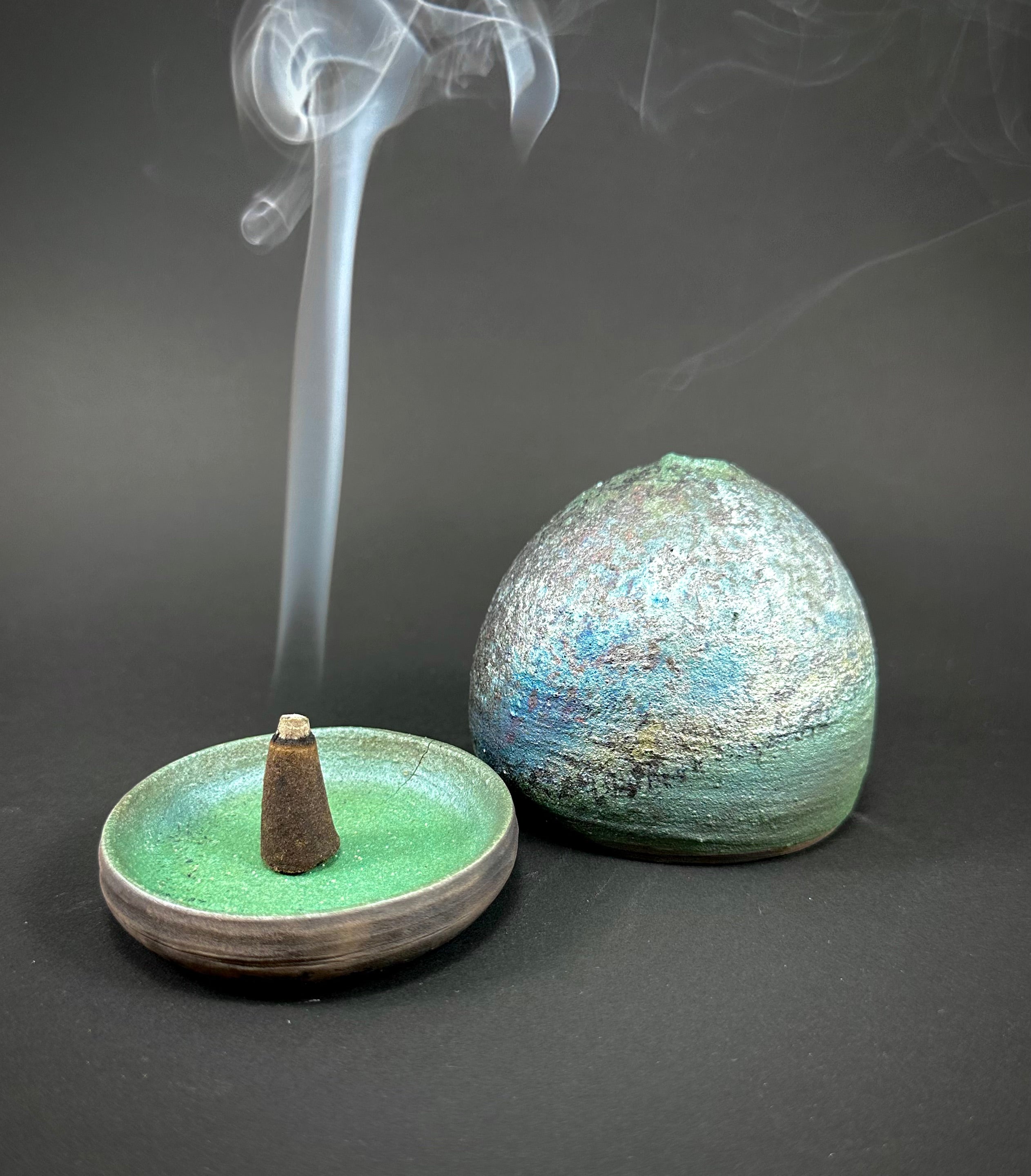 A Raku fired incense dome in a beautiful matte blue/green glaze