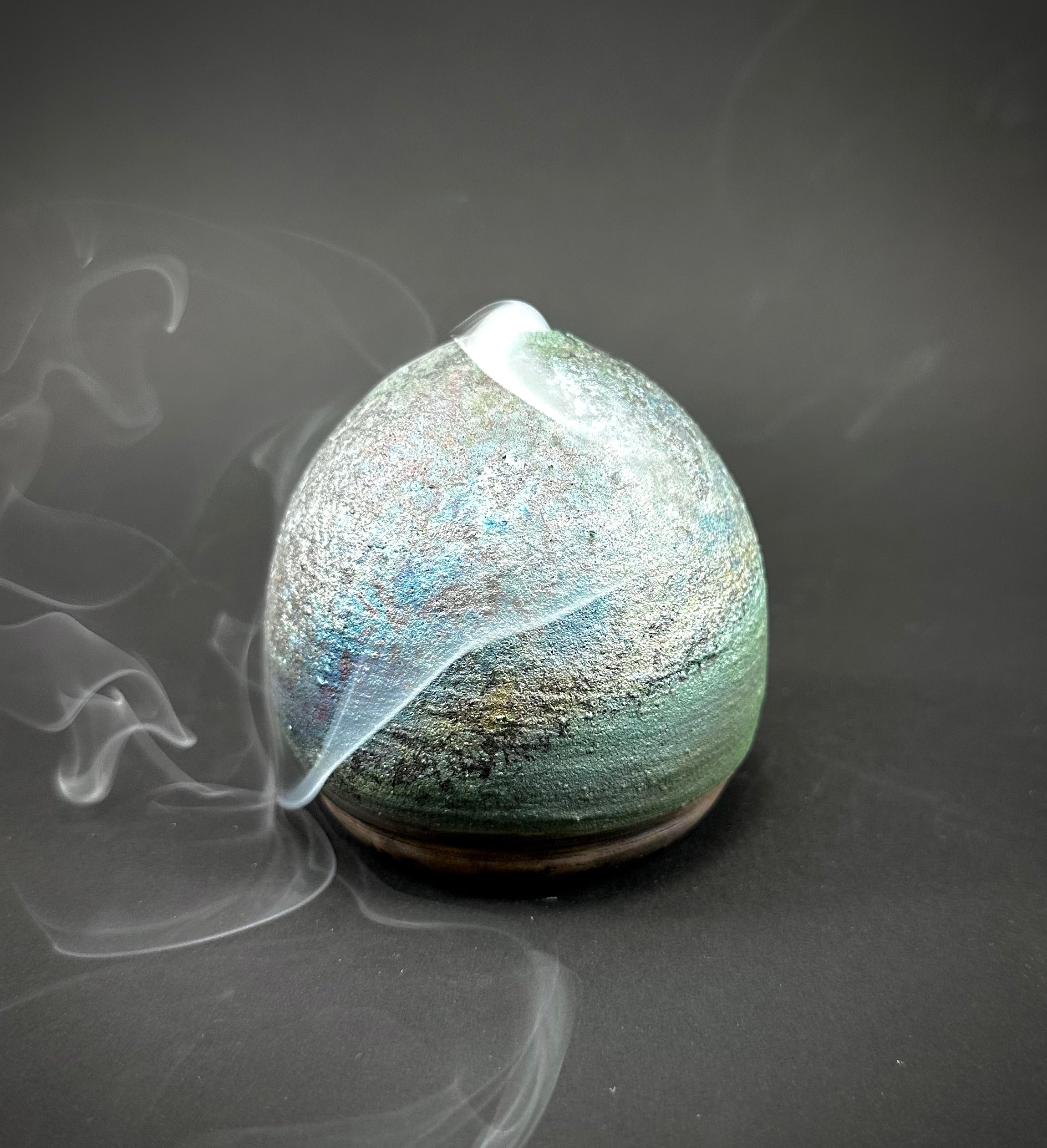 A Raku fired incense dome in a beautiful matte blue/green glaze