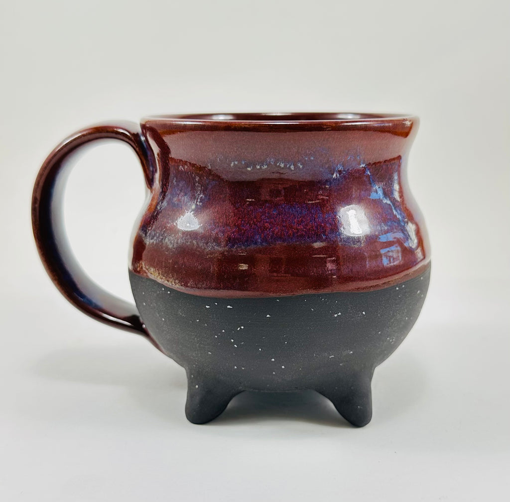 Handmade cauldron mug in a beautiful purple and black glaze