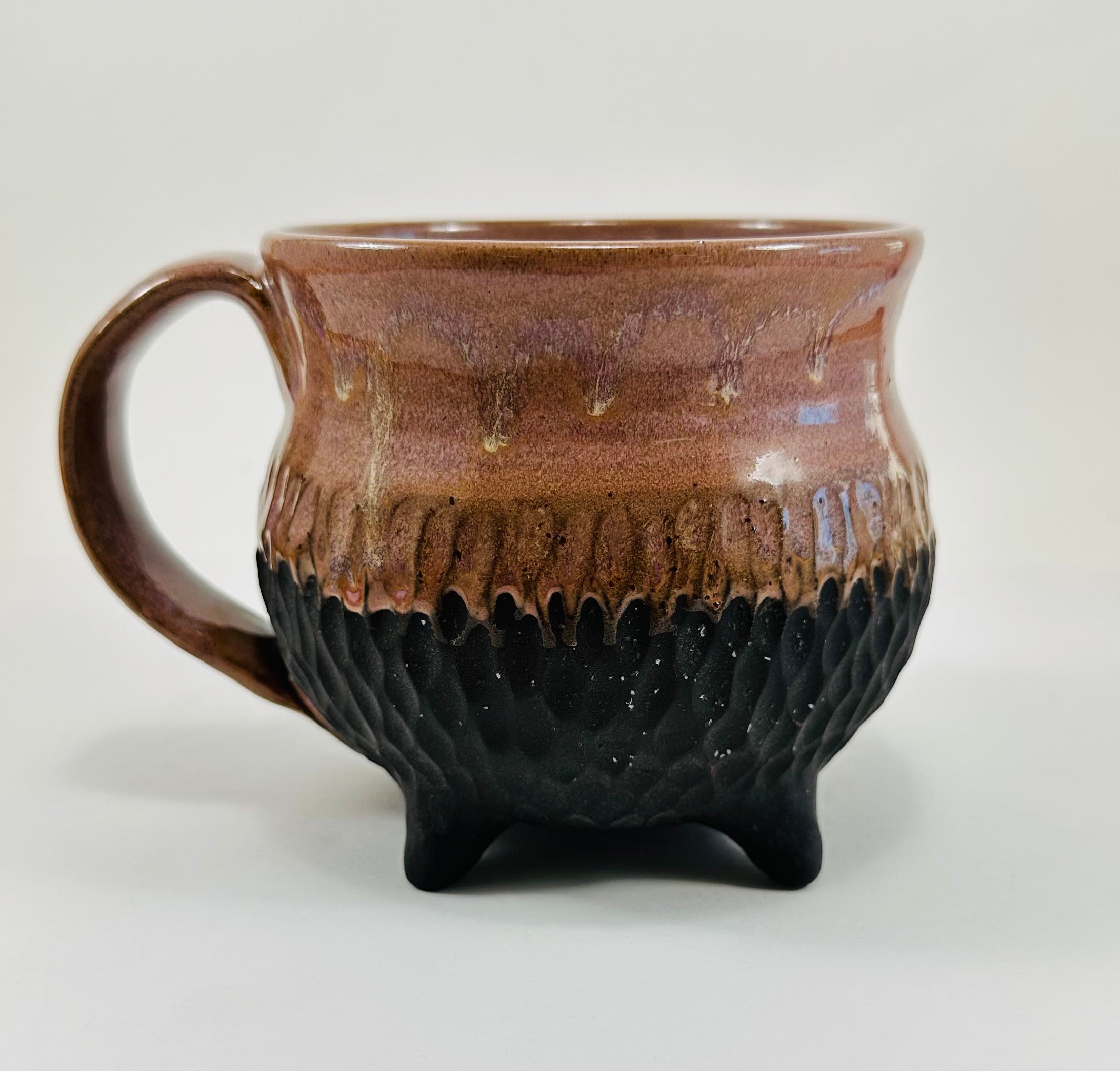 Handmade cauldron mug in a beautiful lavender and black glaze
