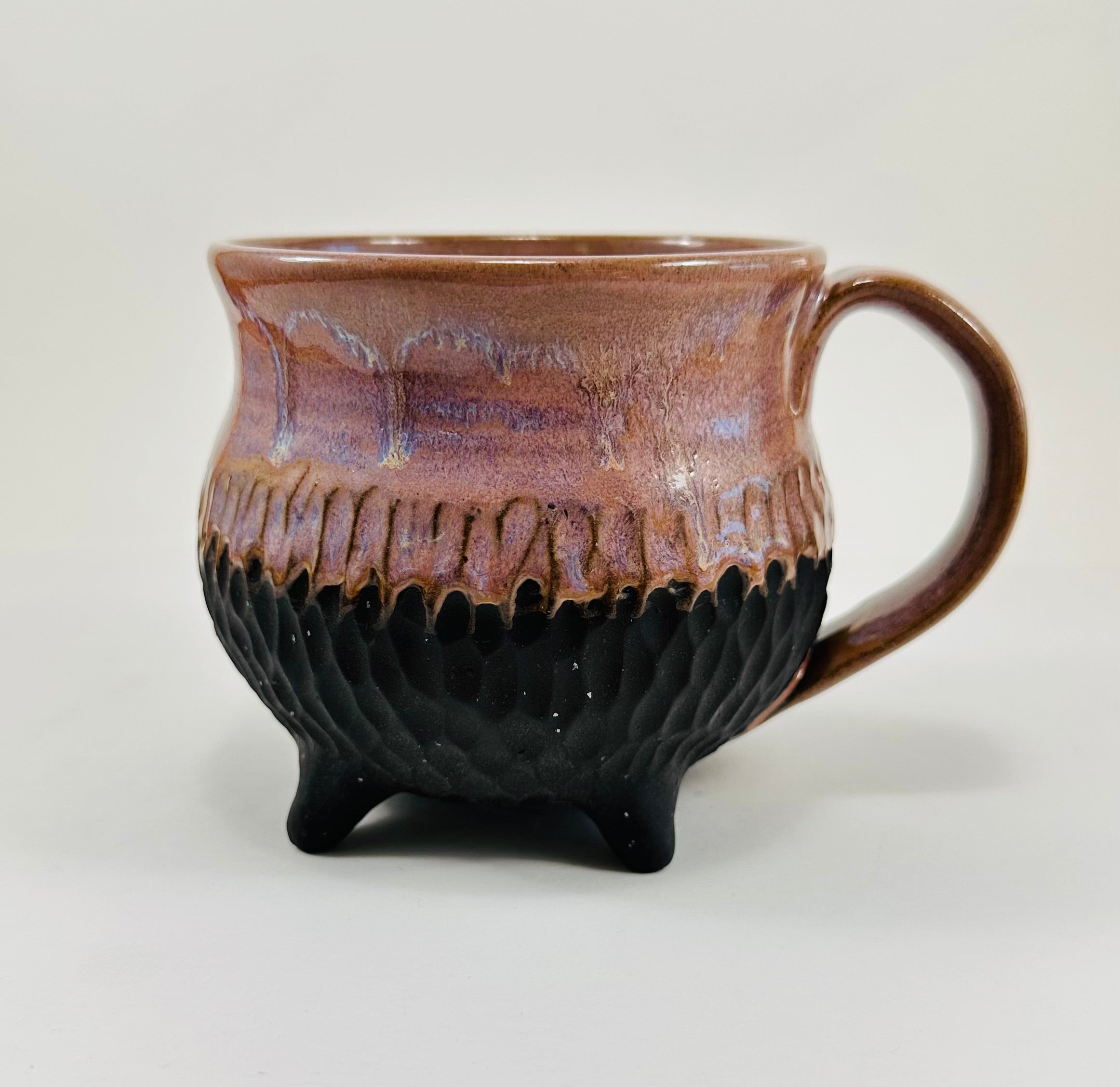 Handmade cauldron mug in a beautiful lavender and black glaze