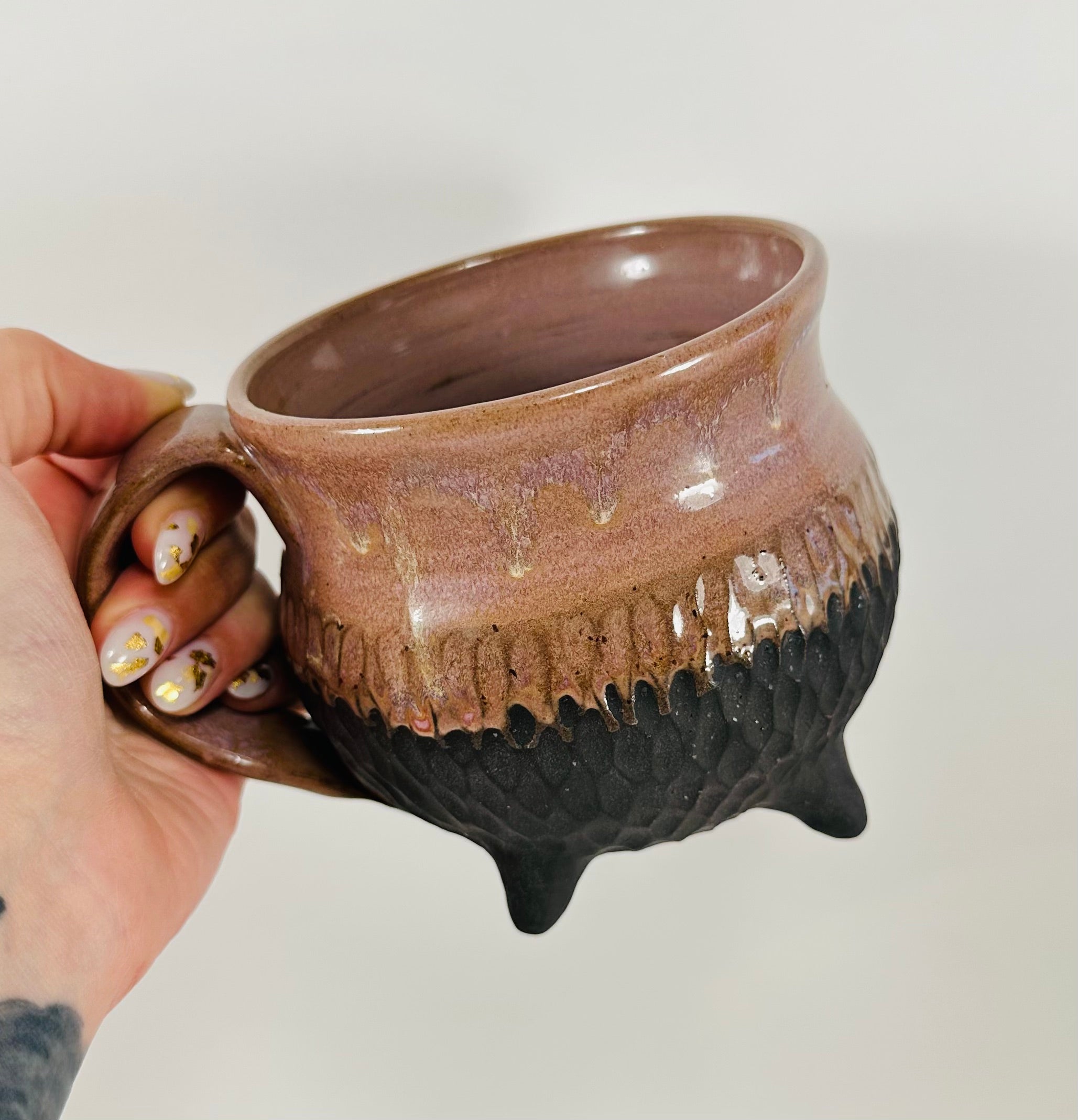 Handmade cauldron mug in a beautiful lavender and black glaze