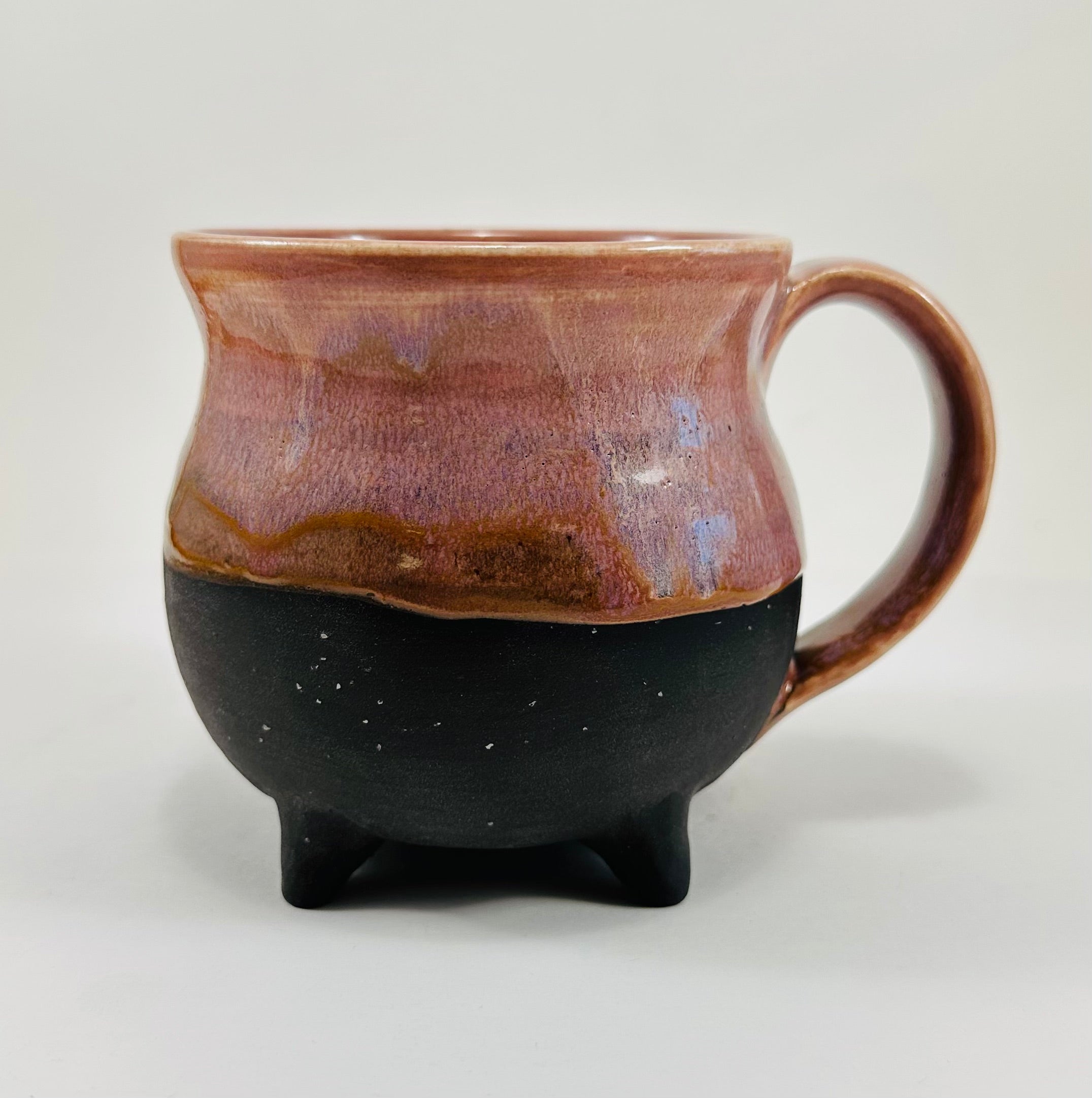 Handmade cauldron mug in a beautiful lavender and black glaze