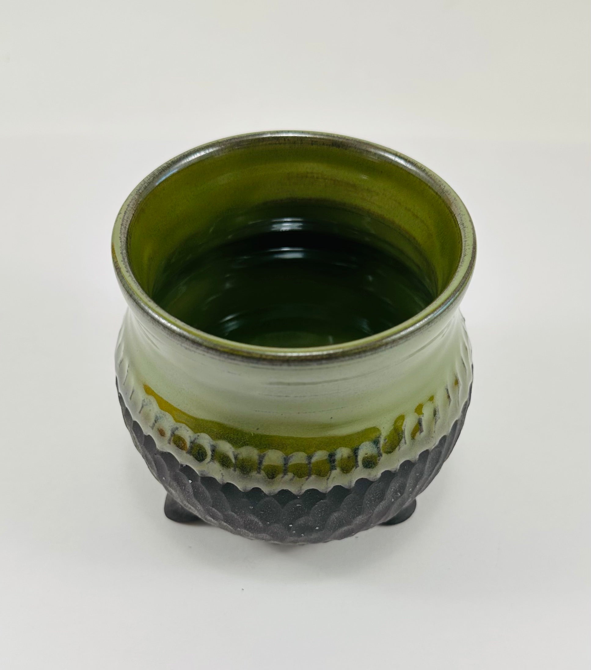 Handmade cauldron in a beautiful green and black glaze
