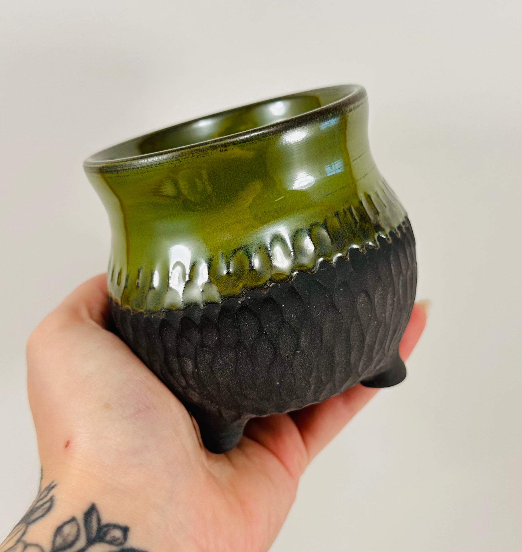 Handmade cauldron in a beautiful green and black glaze