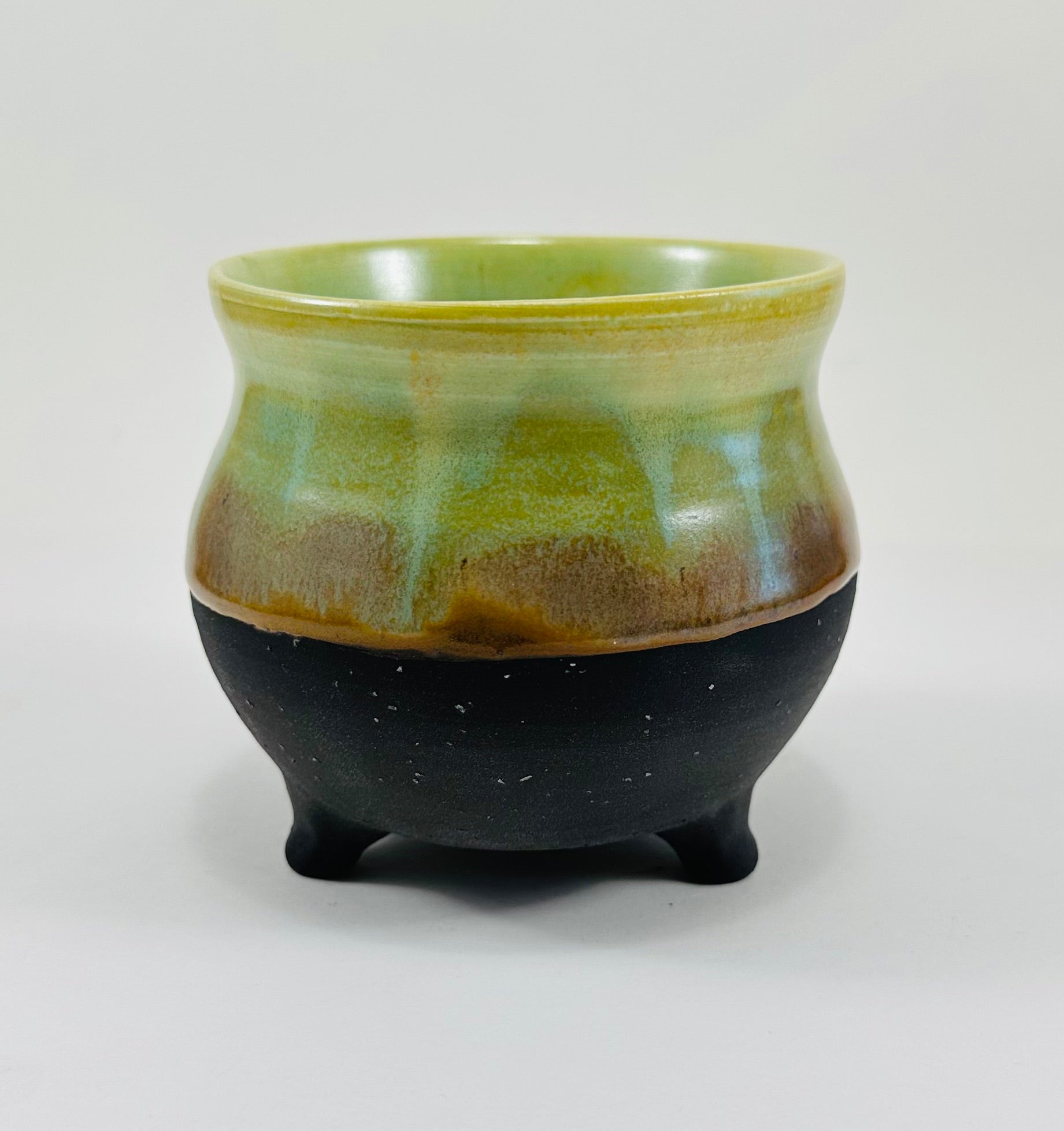 Handmade cauldron in a beautiful green and black glaze