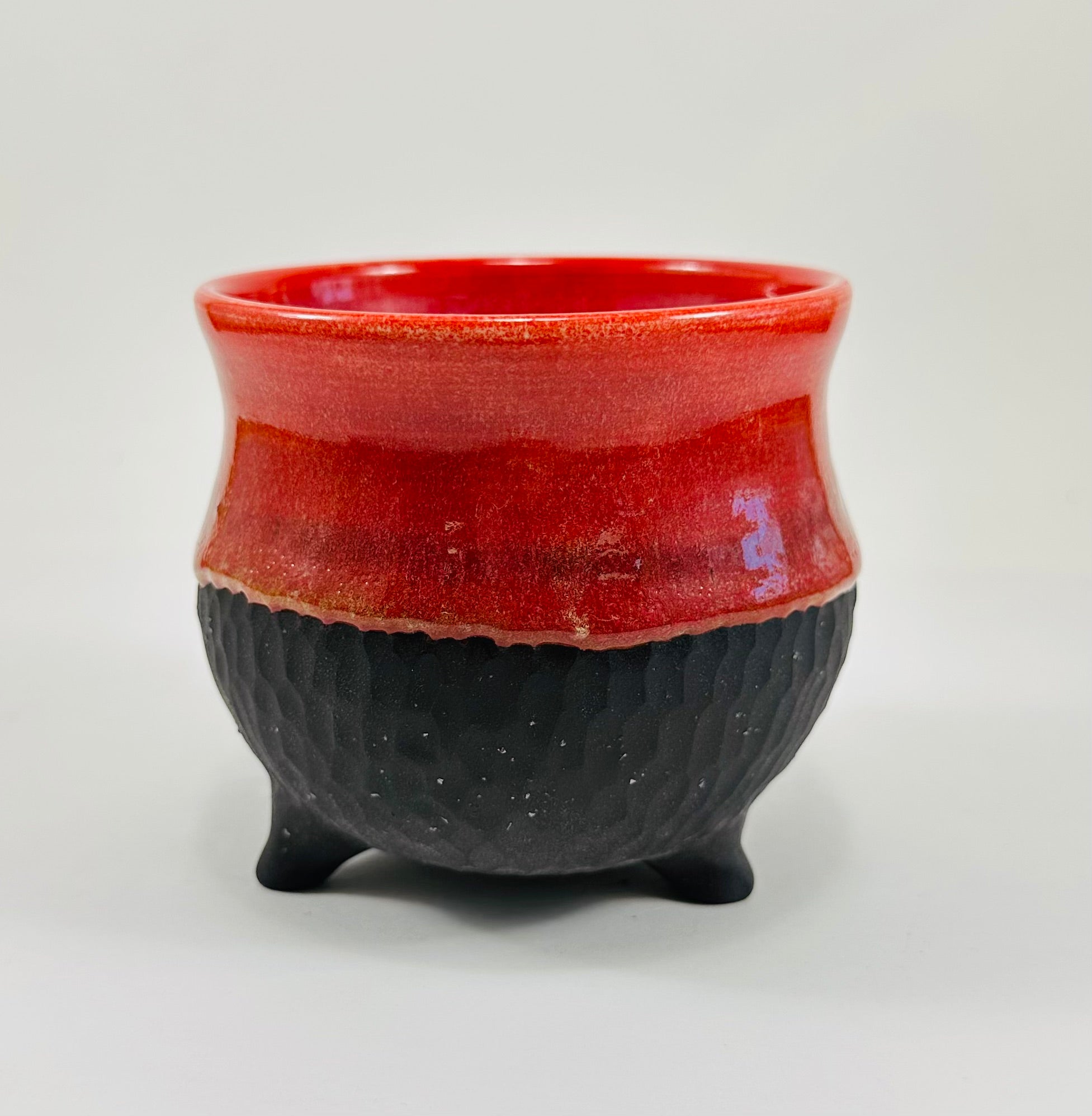 Handmade cauldron in a beautiful red and black glaze