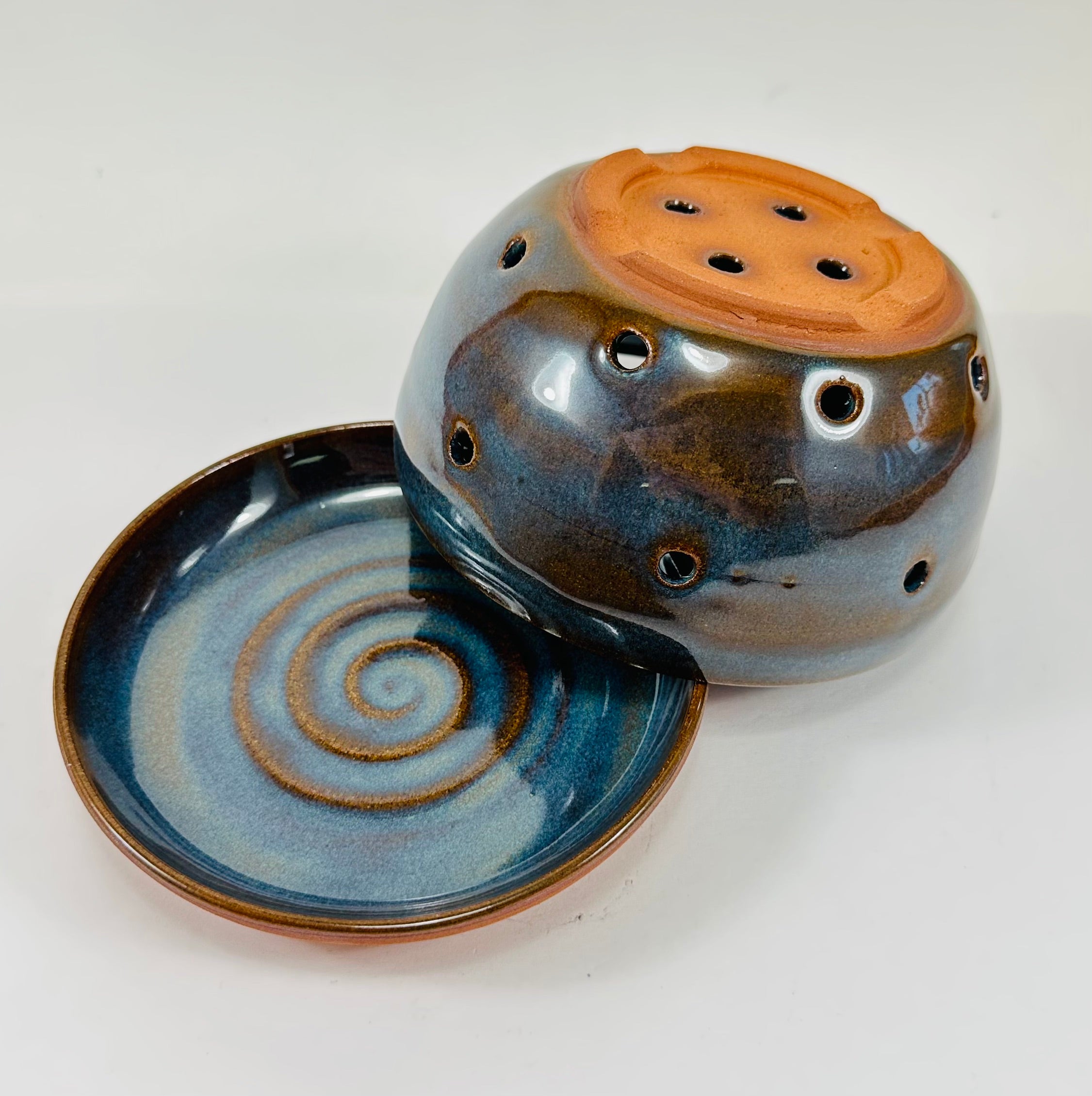 Handmade berry bowl in a beautiful blue and brown glaze.