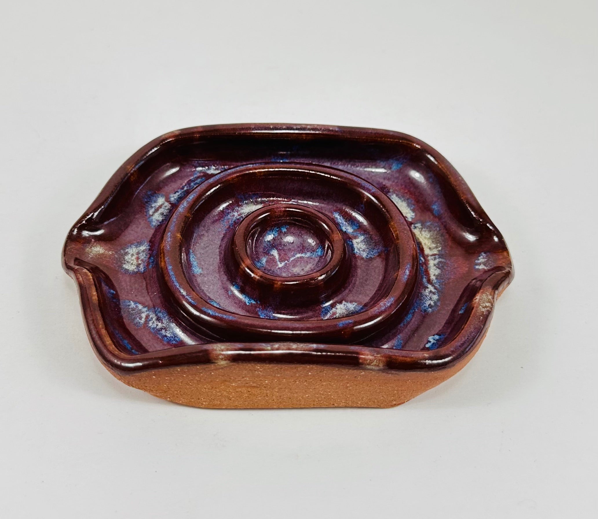 Handmade soap dish in a beautiful purple glaze