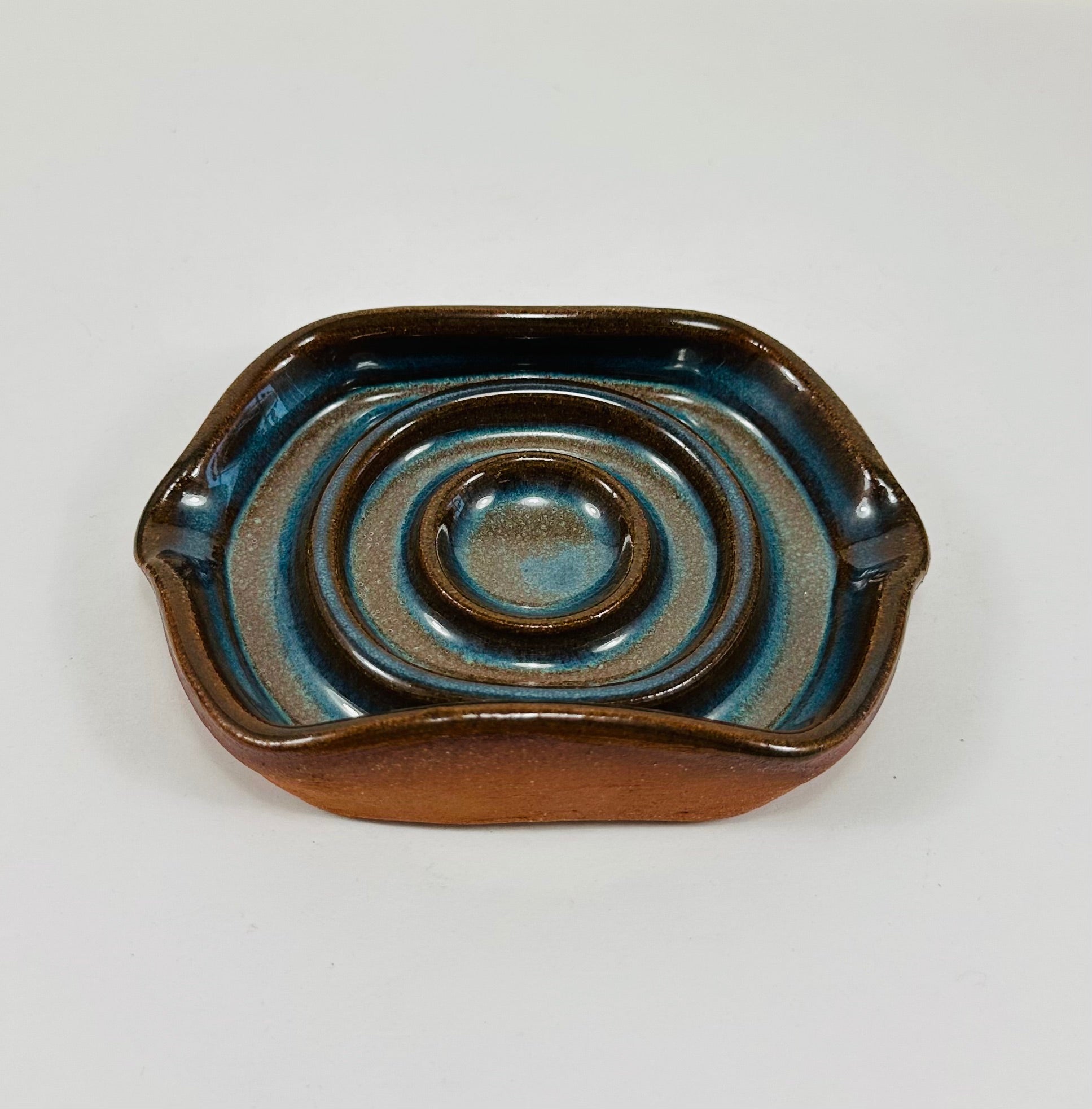 Handmade soap dish in a beautiful blue and brown glaze