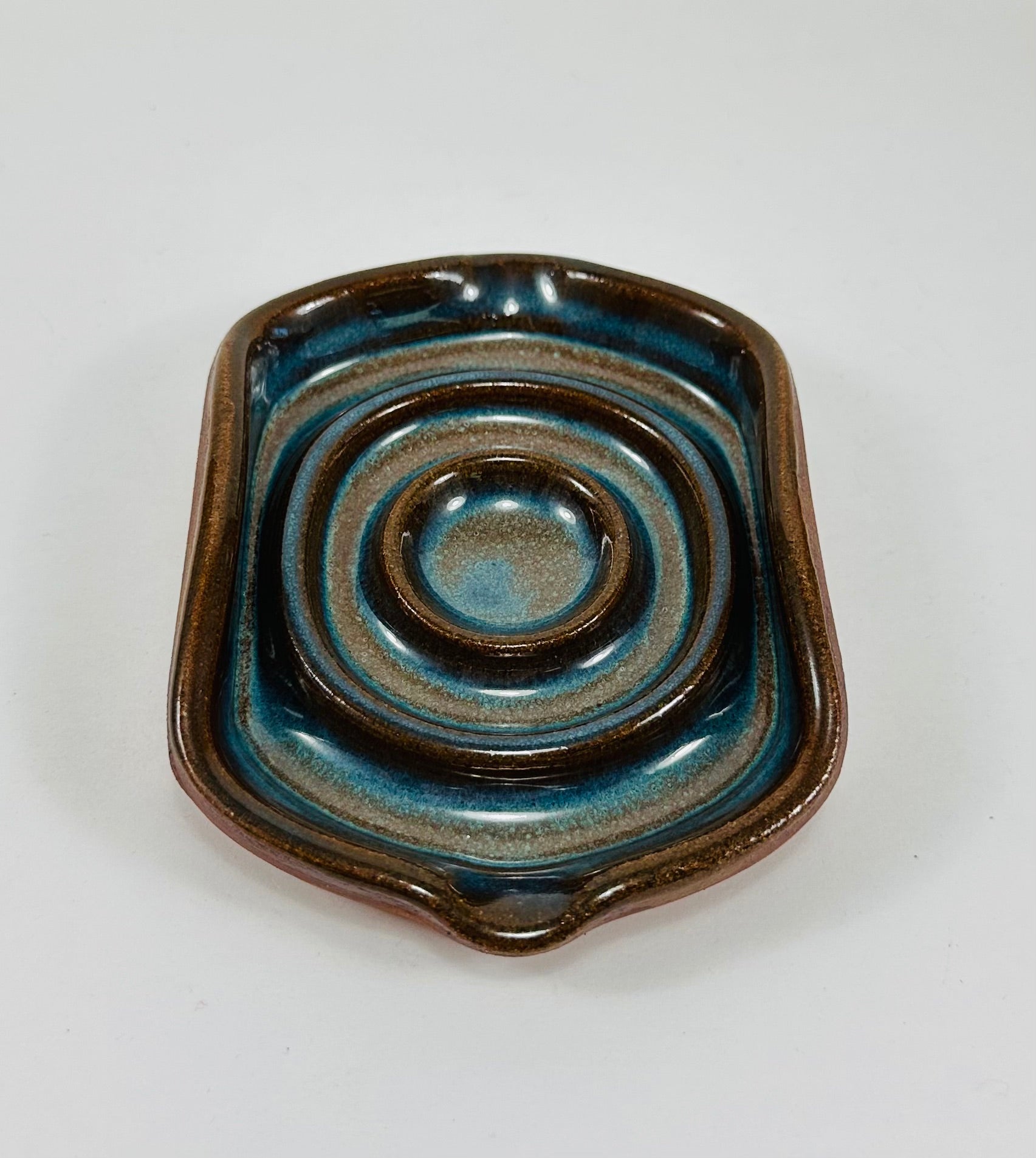Handmade soap dish in a beautiful blue and brown glaze