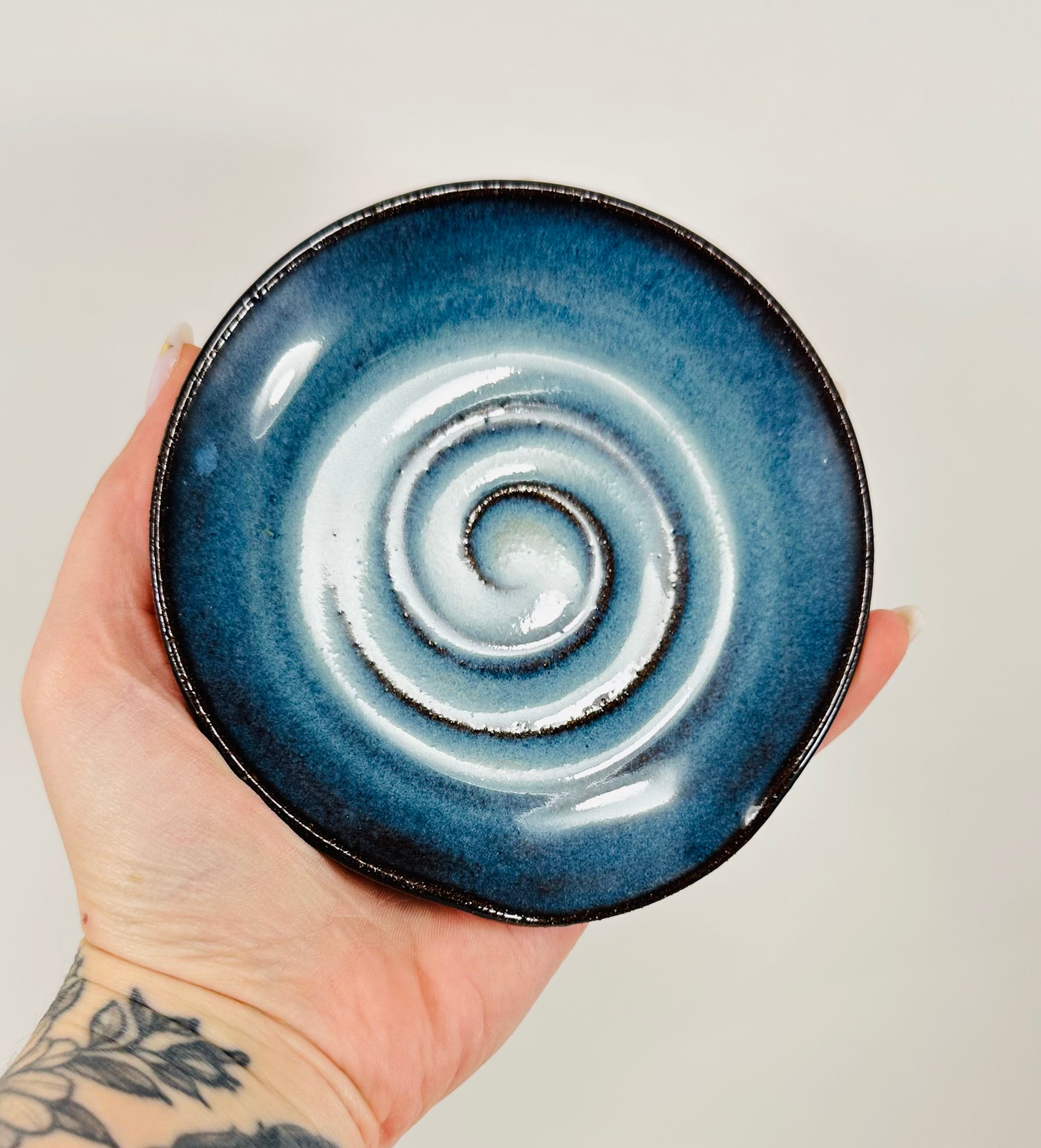 Handmade spoon rest in a beautiful blue glaze.
