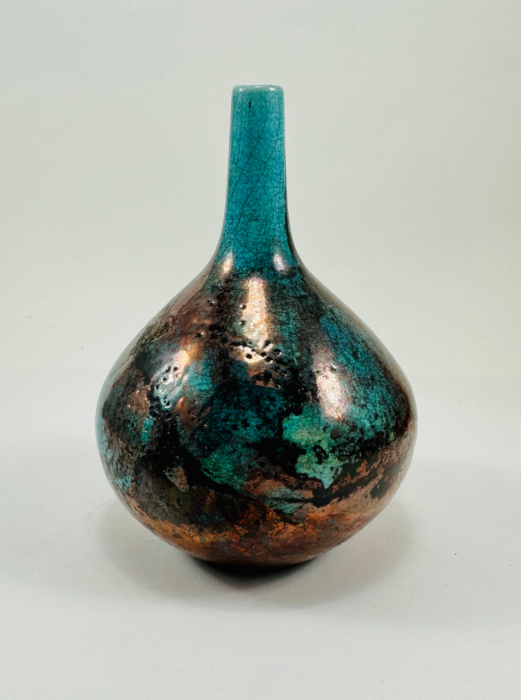 Handmade Raku vase in a beautiful turquoise and copper glaze.