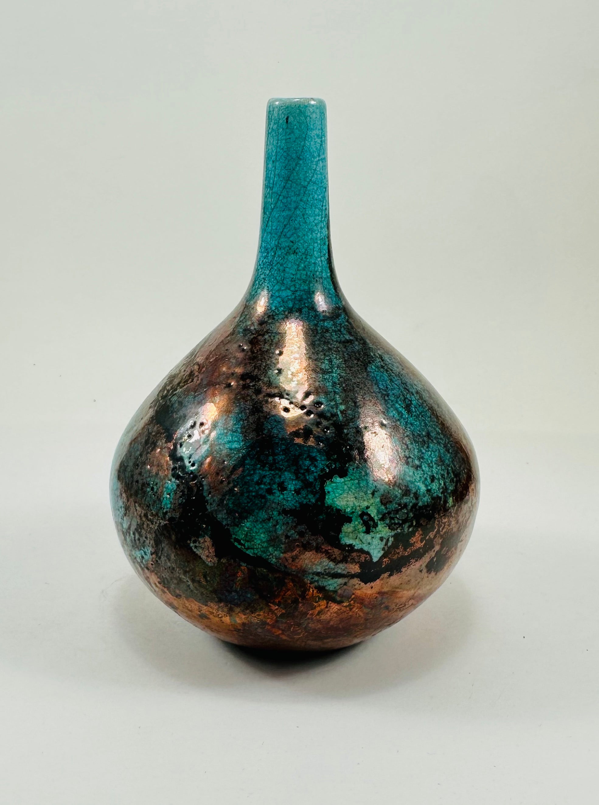 Handmade Raku vase in a beautiful turquoise and copper glaze.