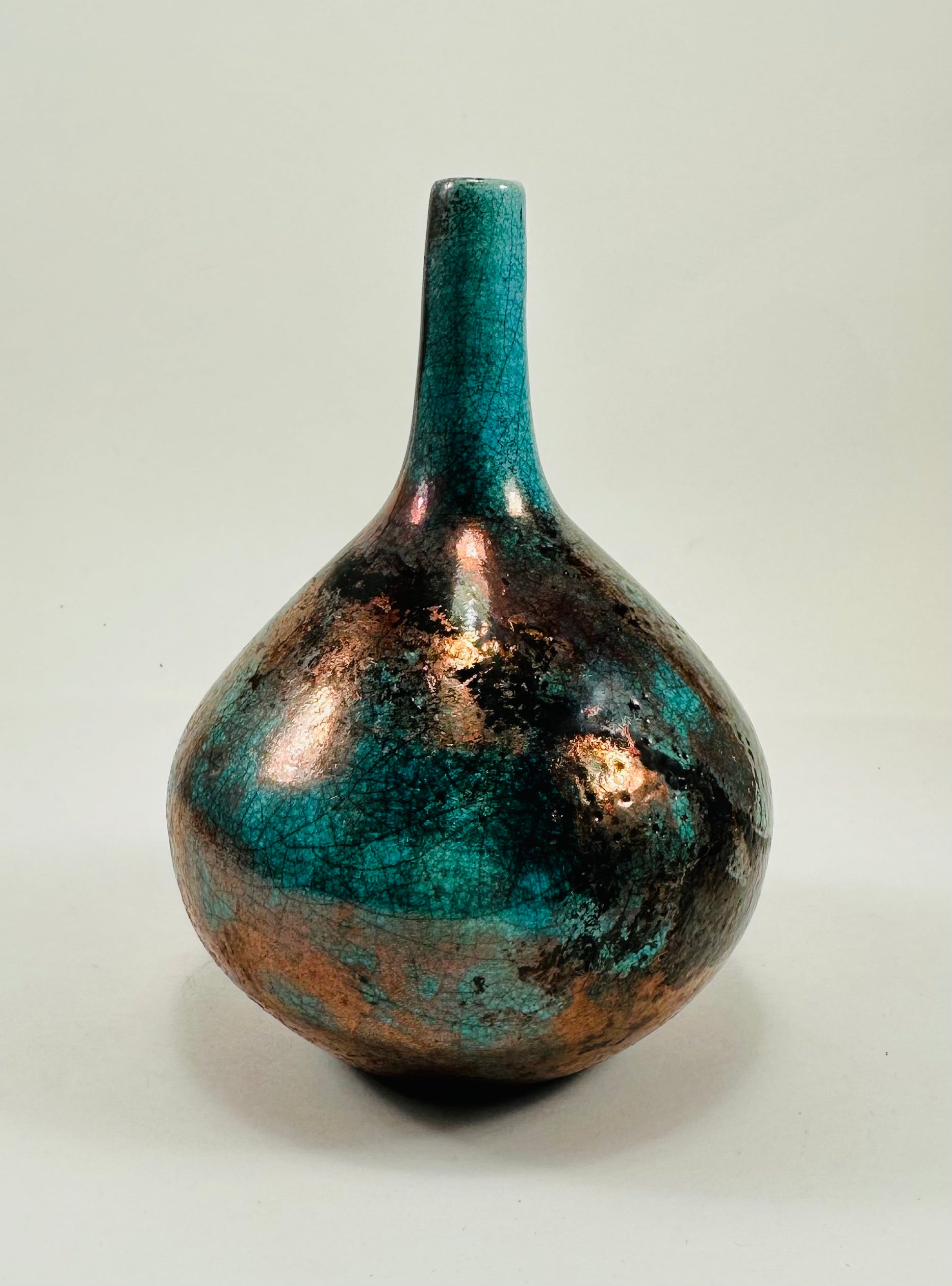 Handmade Raku vase in a beautiful turquoise and copper glaze.