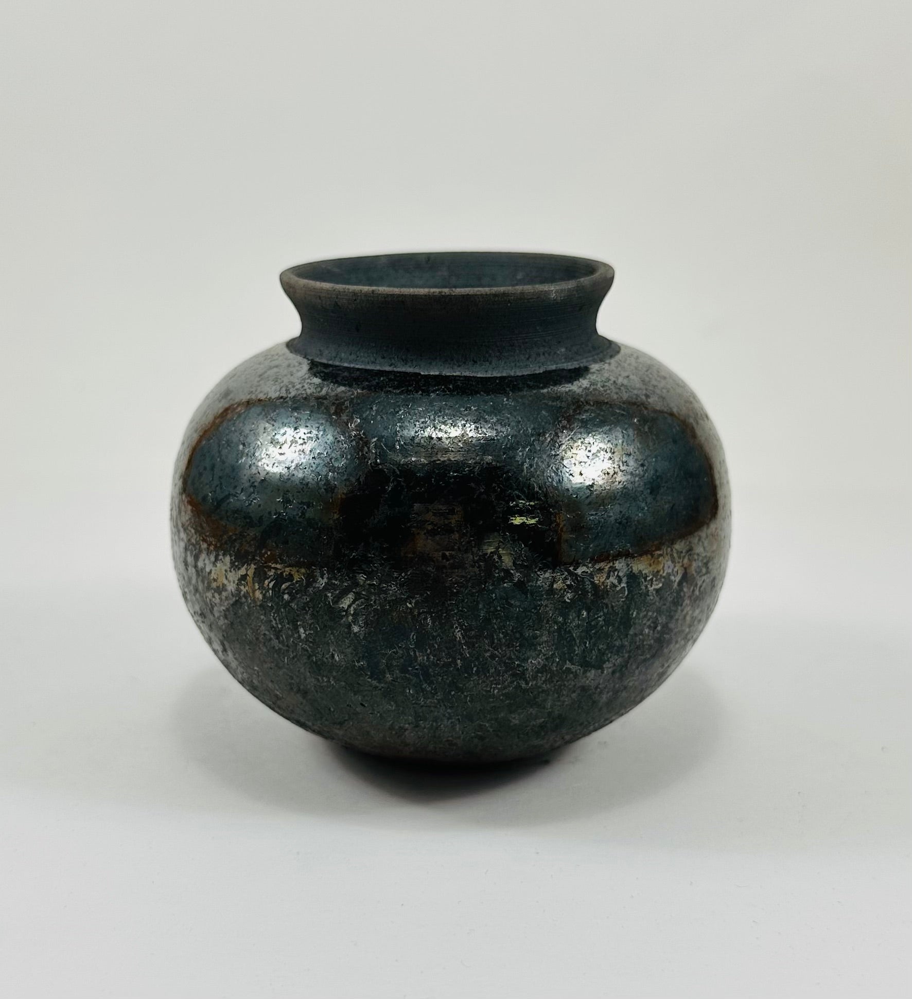 Handmade Raku vase in a beautiful black metallic glaze.