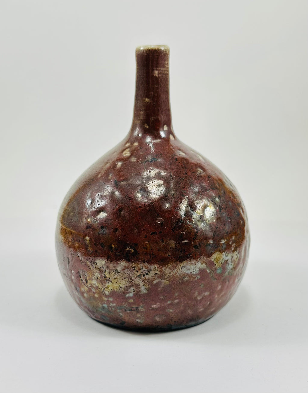 Handmade Raku vase in a beautiful yellow and red glaze.