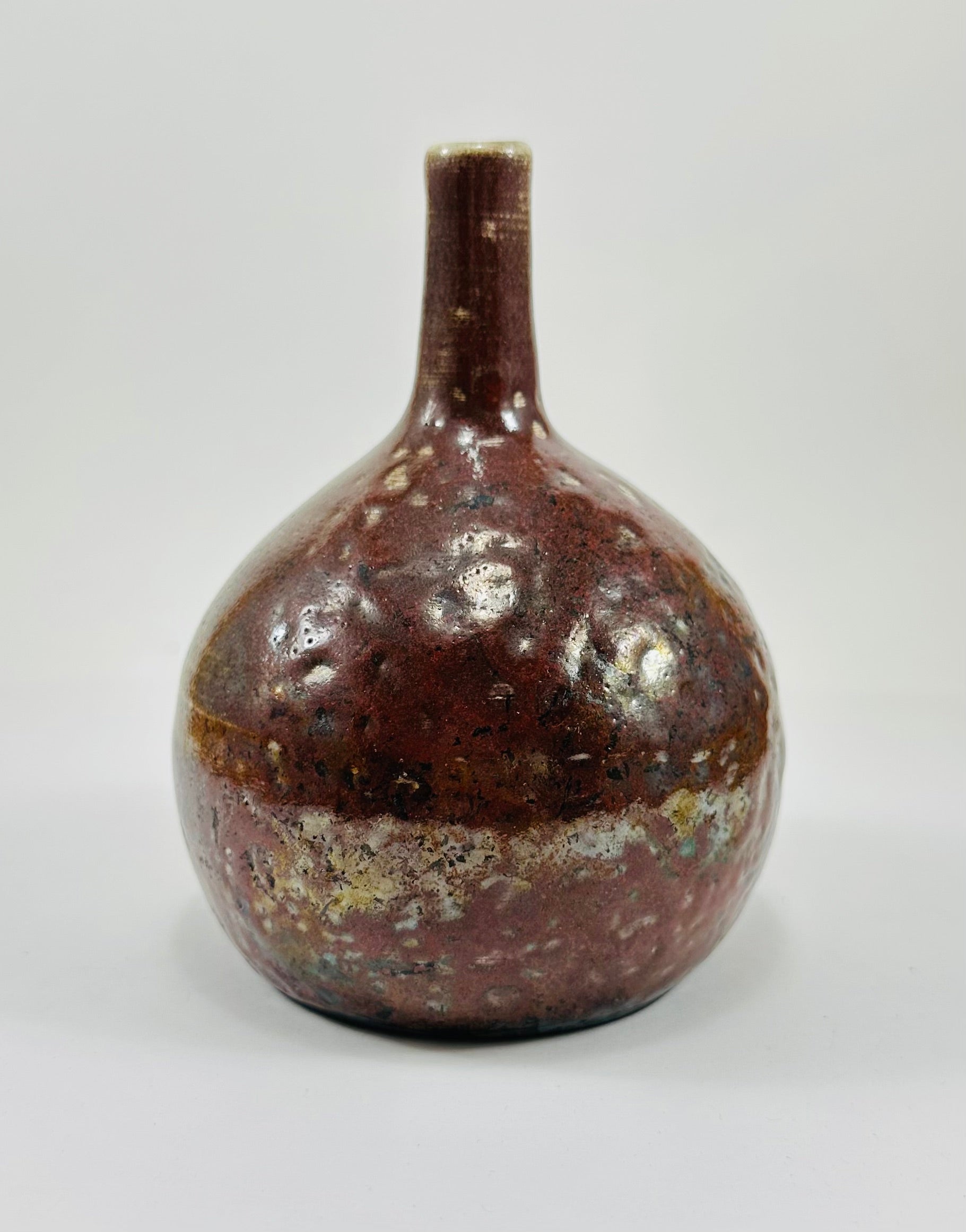 Handmade Raku vase in a beautiful yellow and red glaze.