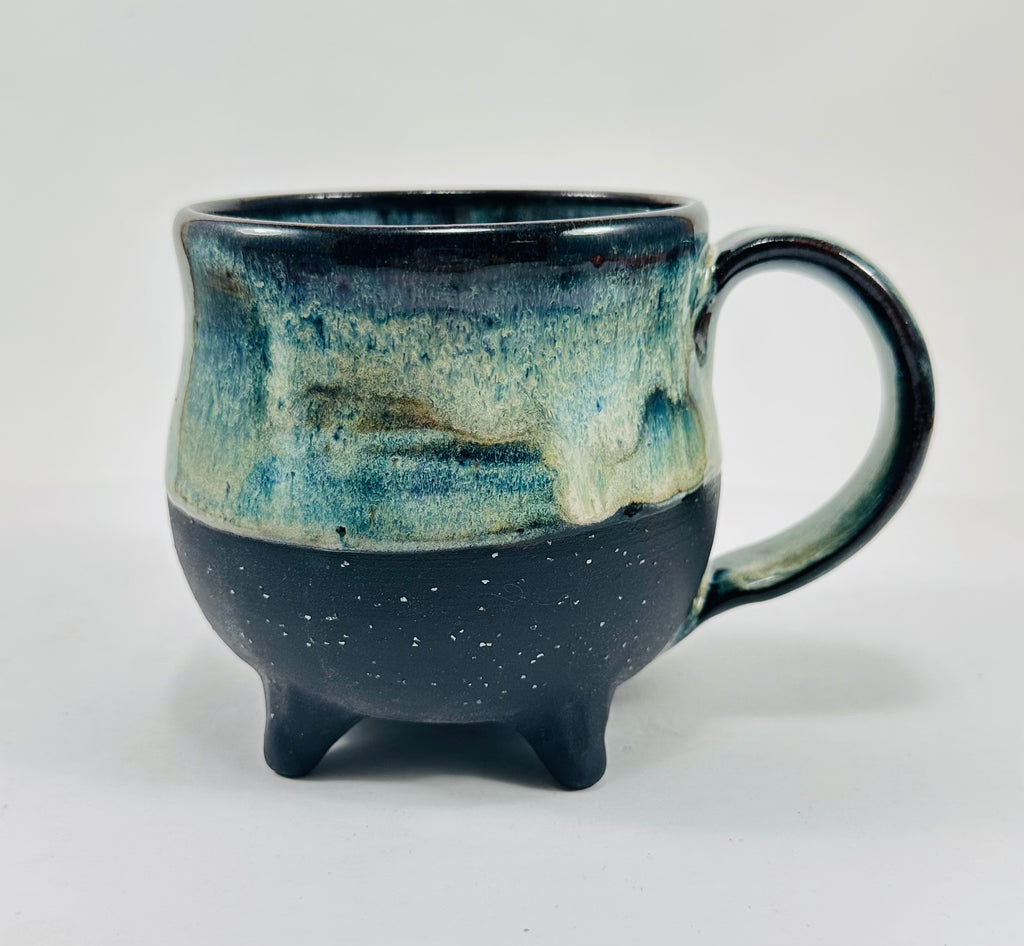 Handmade ceramic cauldron mug in a beautiful blue/green glaze
