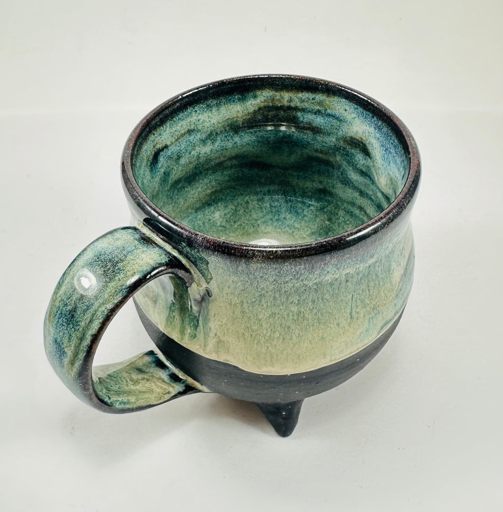 Handmade ceramic cauldron mug in a beautiful blue/green glaze