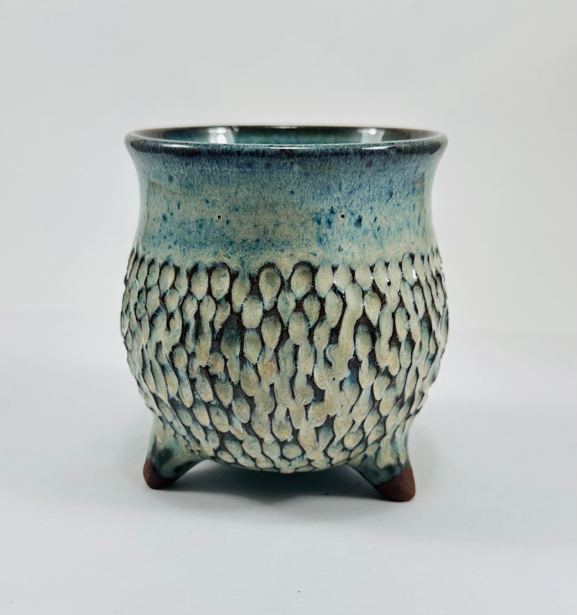 Handmade ceramic cauldron in a beautiful blue/yellow/green glaze