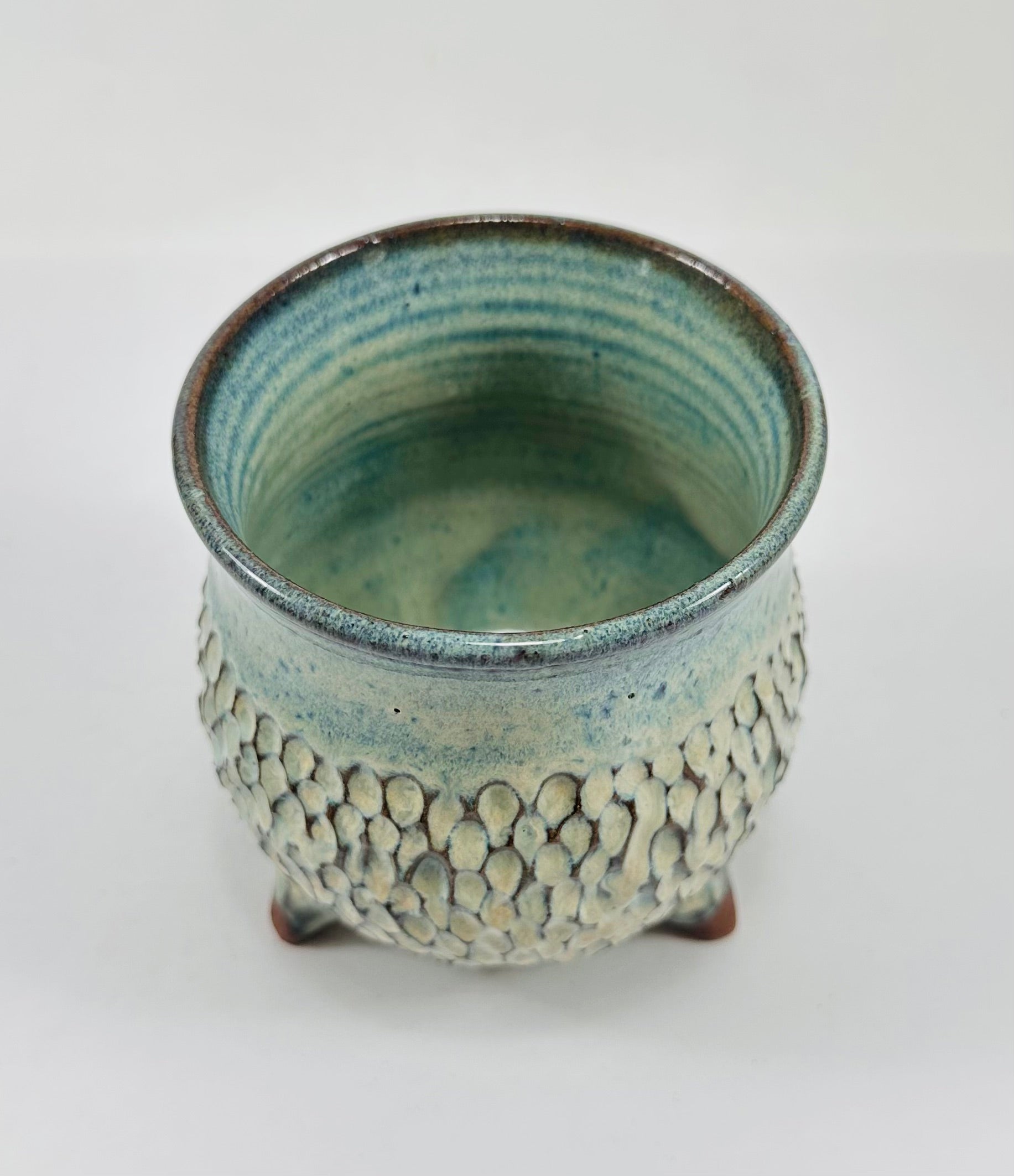Handmade ceramic cauldron in a beautiful blue/yellow/green glaze