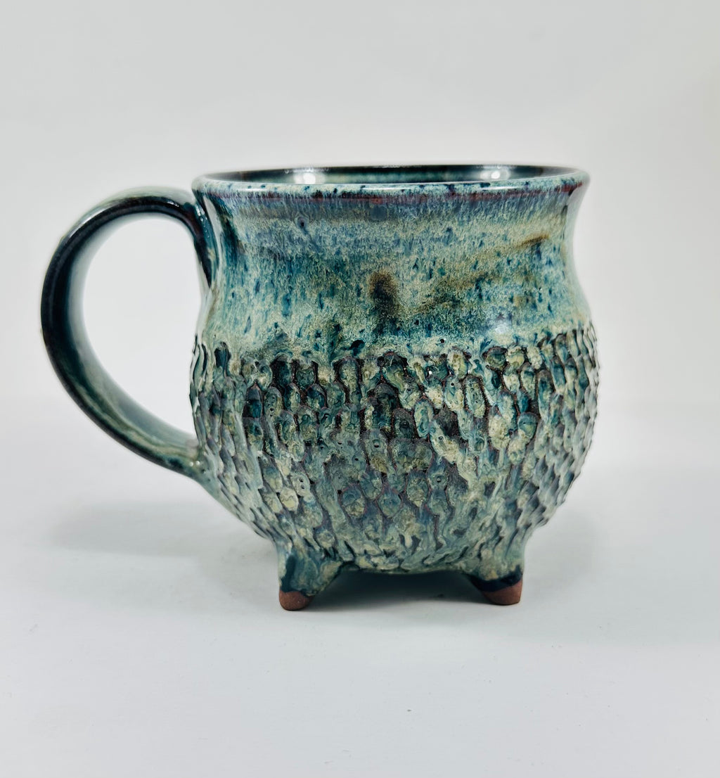 Handmade ceramic cauldron mug in a beautiful blue/green glaze