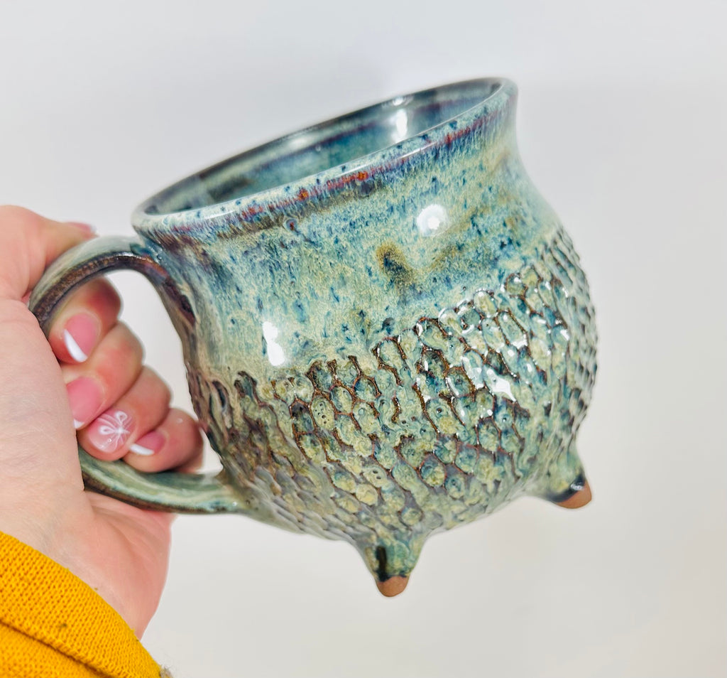 Handmade ceramic cauldron mug in a beautiful blue/green glaze