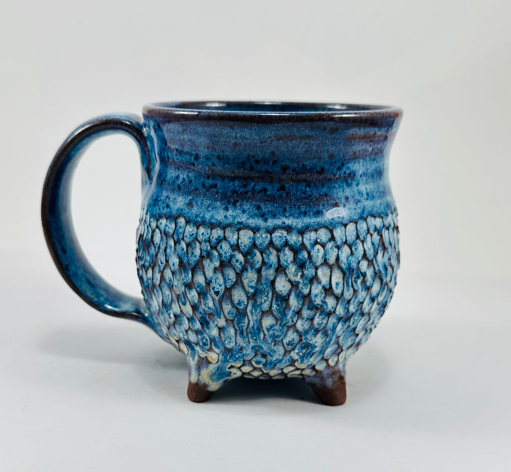 Handmade ceramic cauldron mug in a beautiful blue glaze