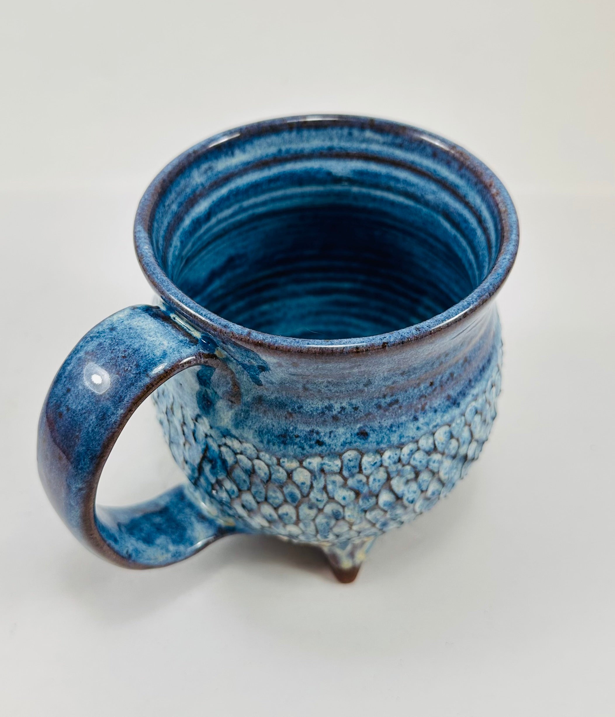 Handmade ceramic cauldron mug in a beautiful blue glaze