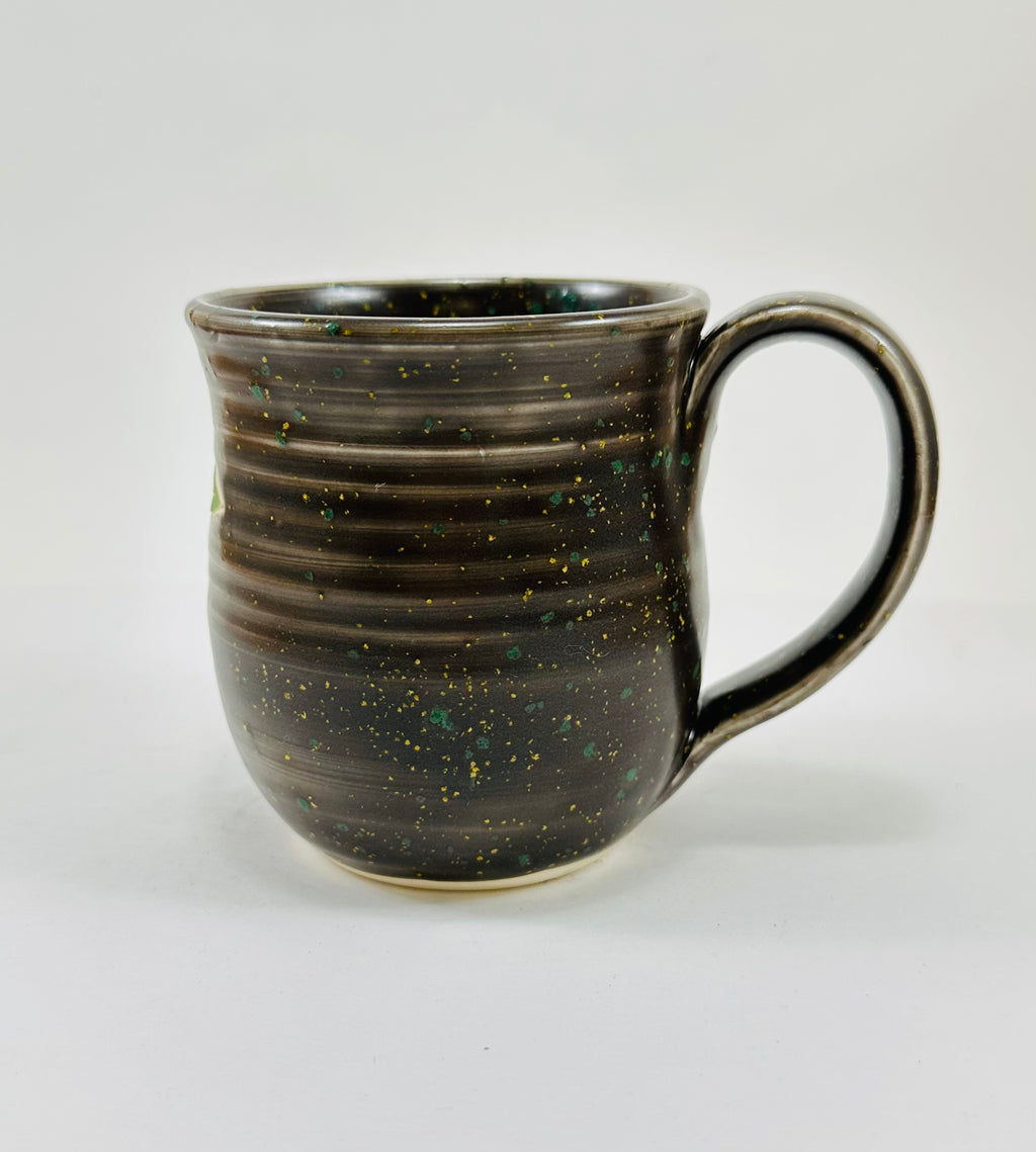 handmade ceramic mug in a beautiful brown glaze and a fox illustration on it