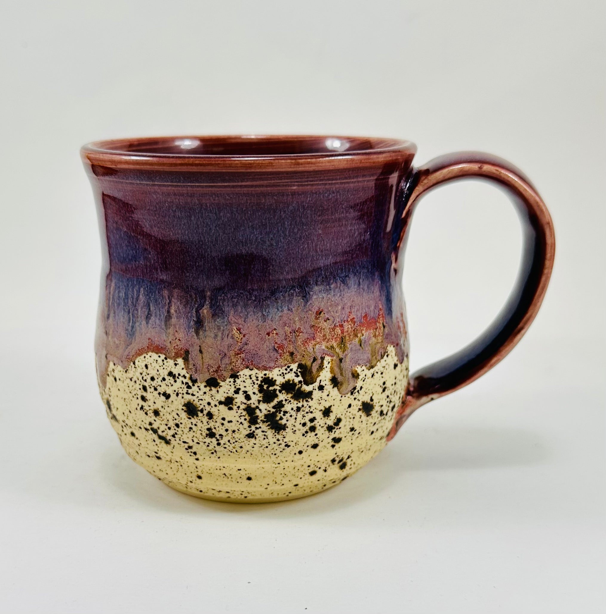 handmade ceramic mug in a beautiful purple and brown glaze