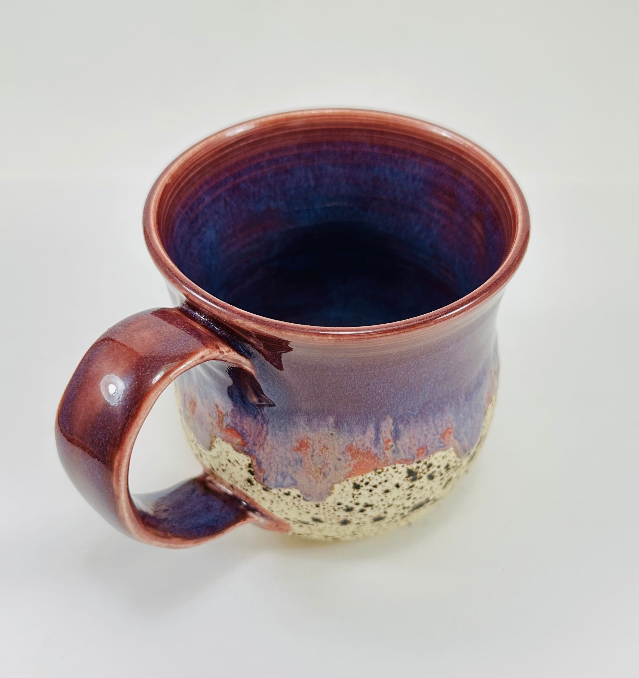 handmade ceramic mug in a beautiful purple and brown glaze