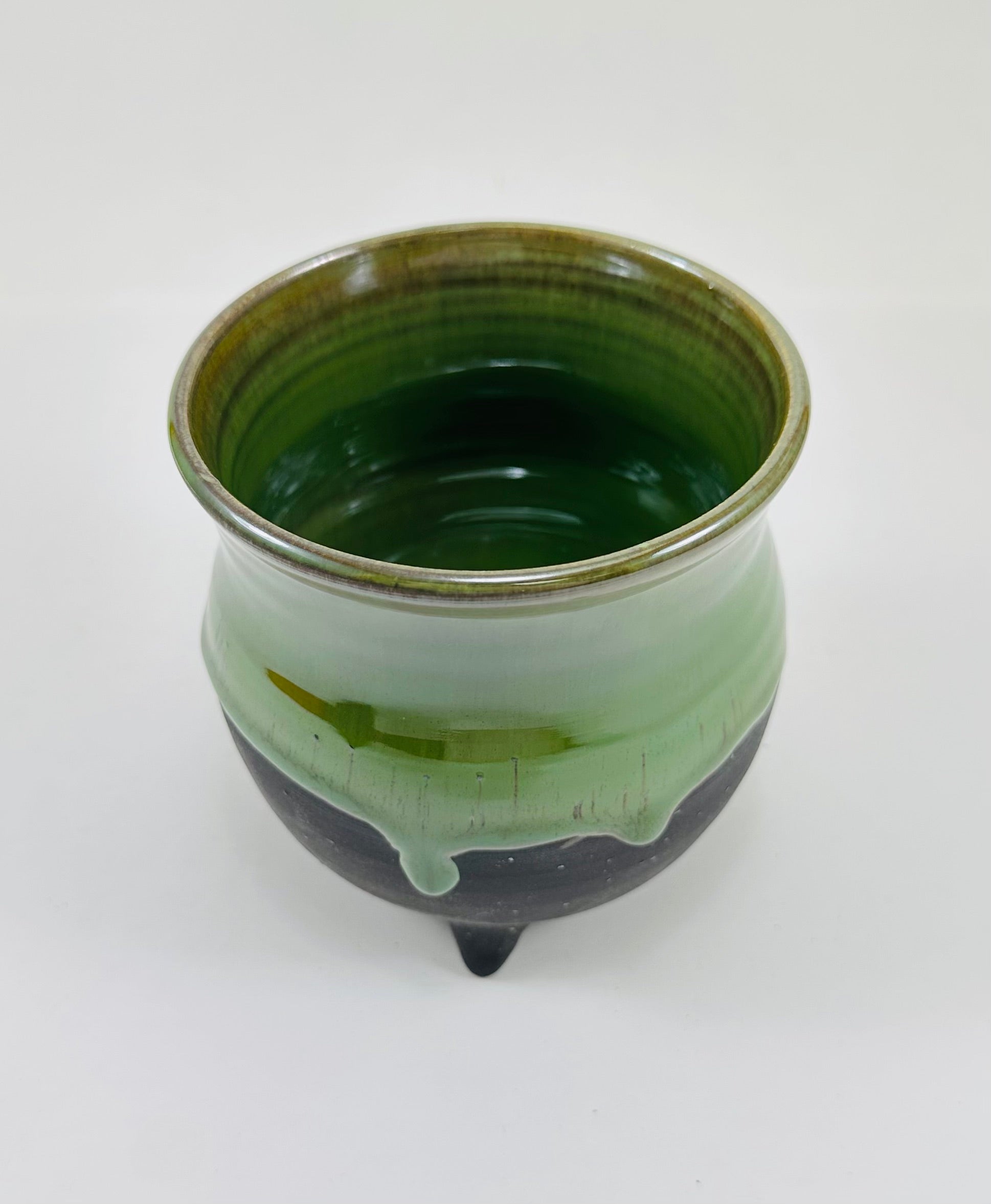 handmade ceramic cauldron in a beautiful green and black glaze