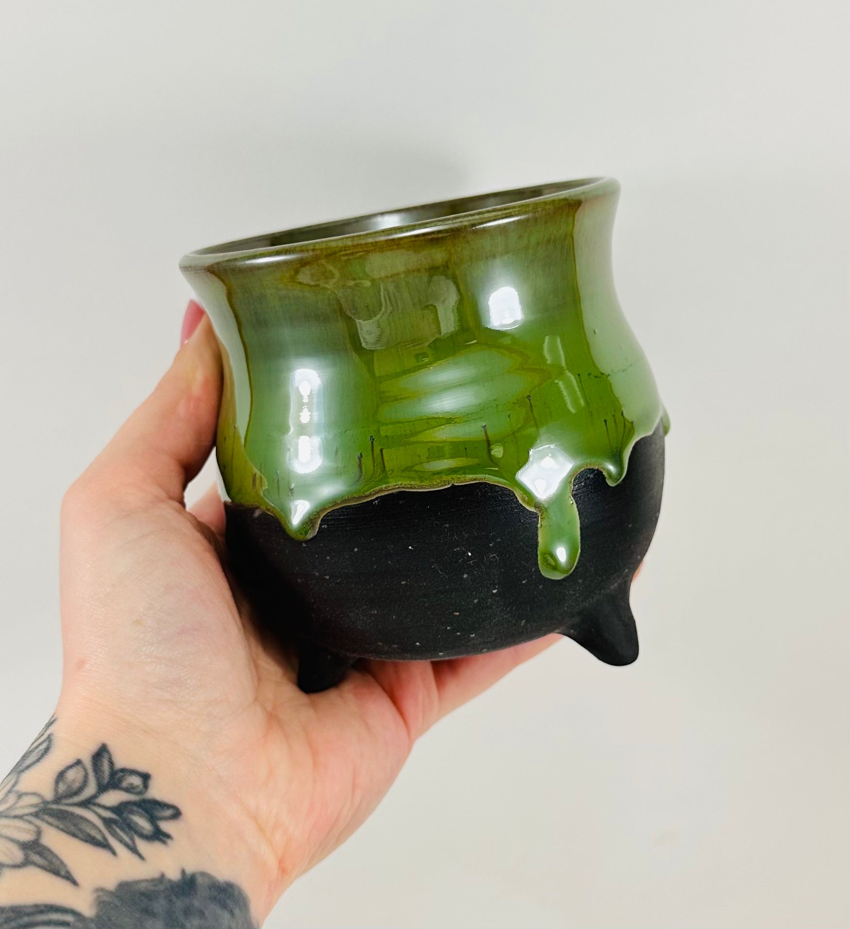 handmade ceramic cauldron in a beautiful green and black glaze