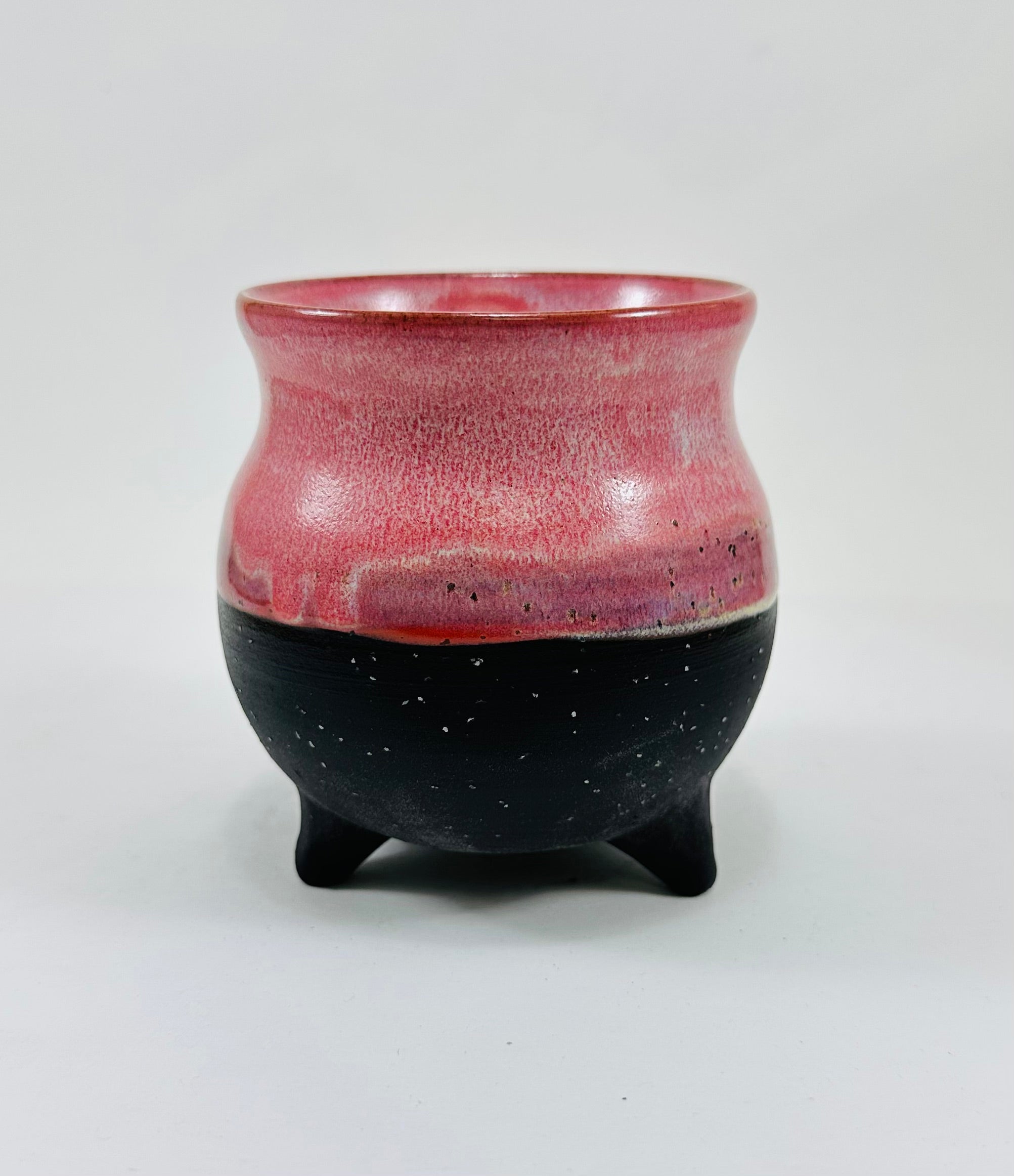 handmade ceramic cauldron in a beautiful pink and black glaze
