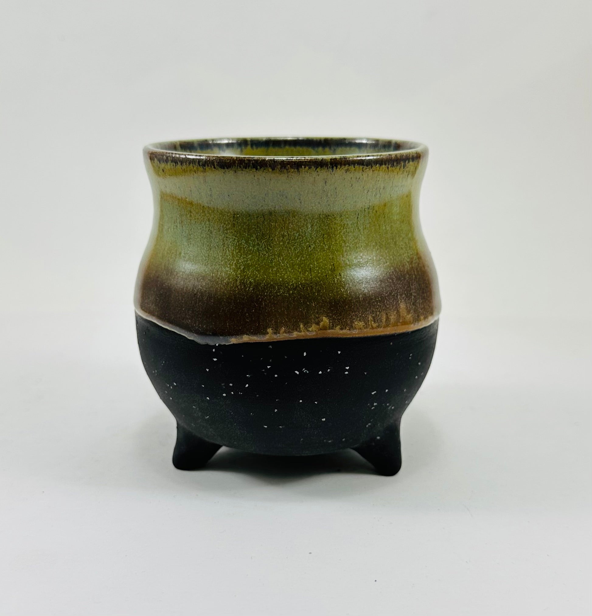 handmade ceramic cauldron in a beautiful green and black glaze