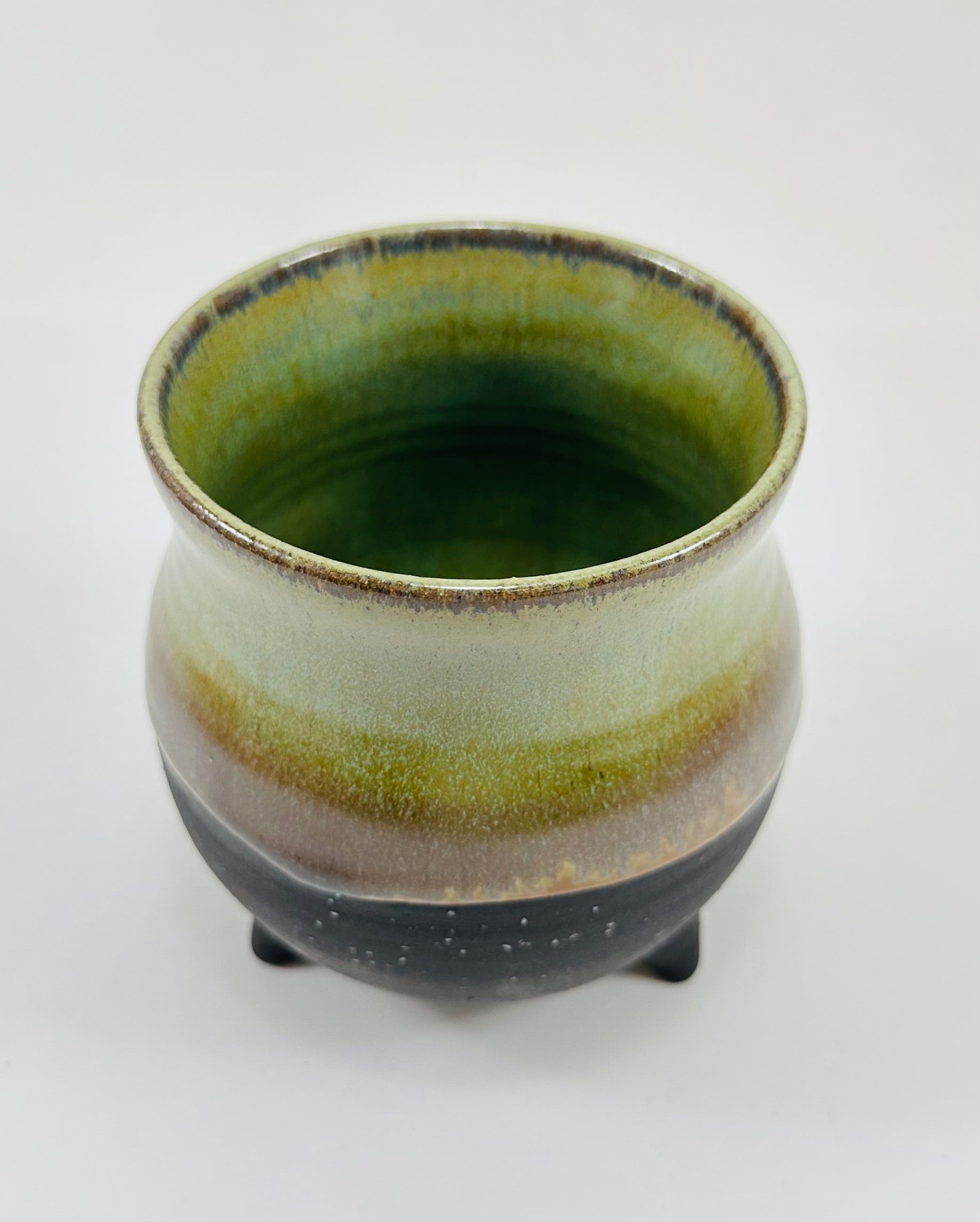handmade ceramic cauldron in a beautiful green and black glaze