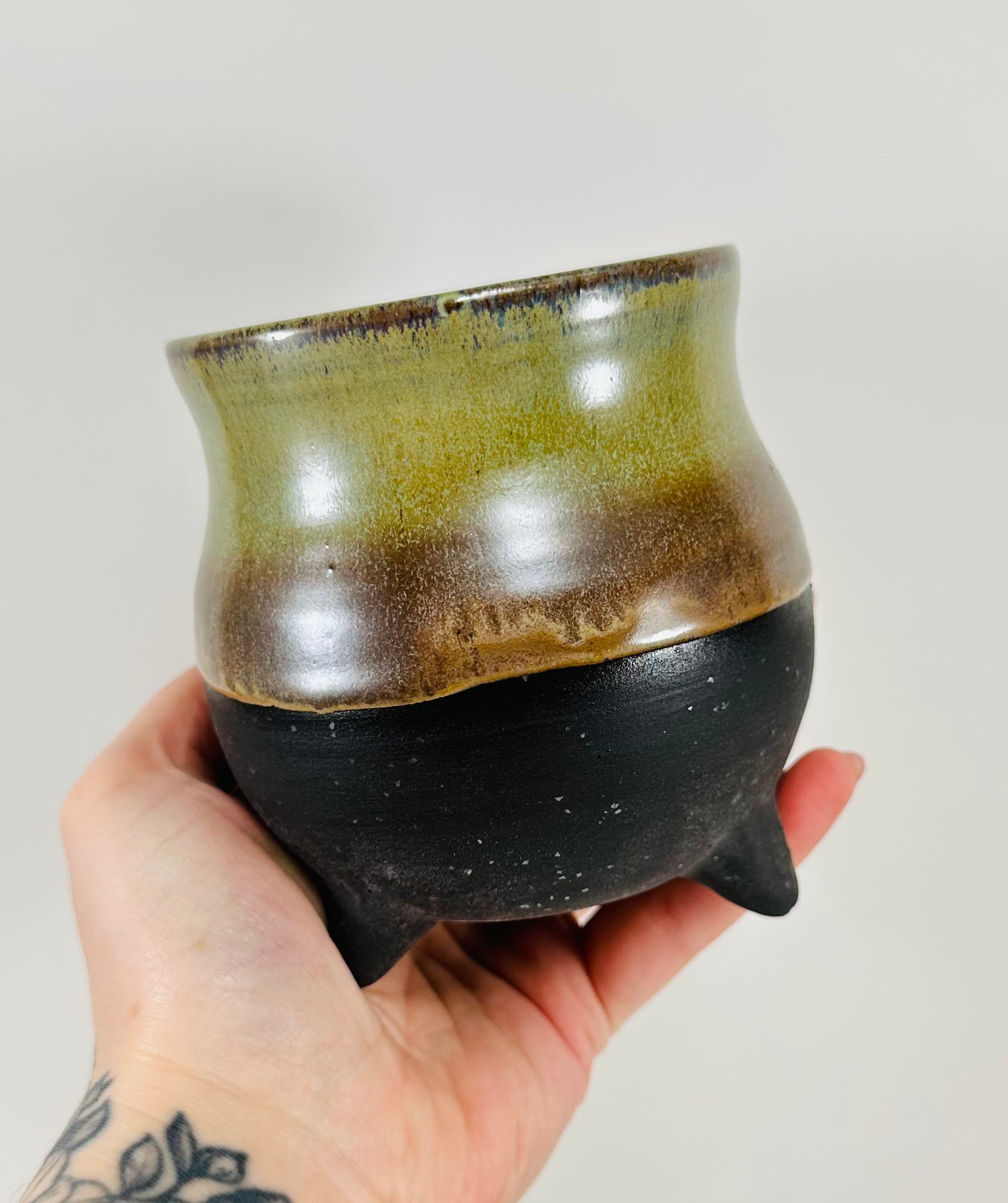 handmade ceramic cauldron in a beautiful green and black glaze