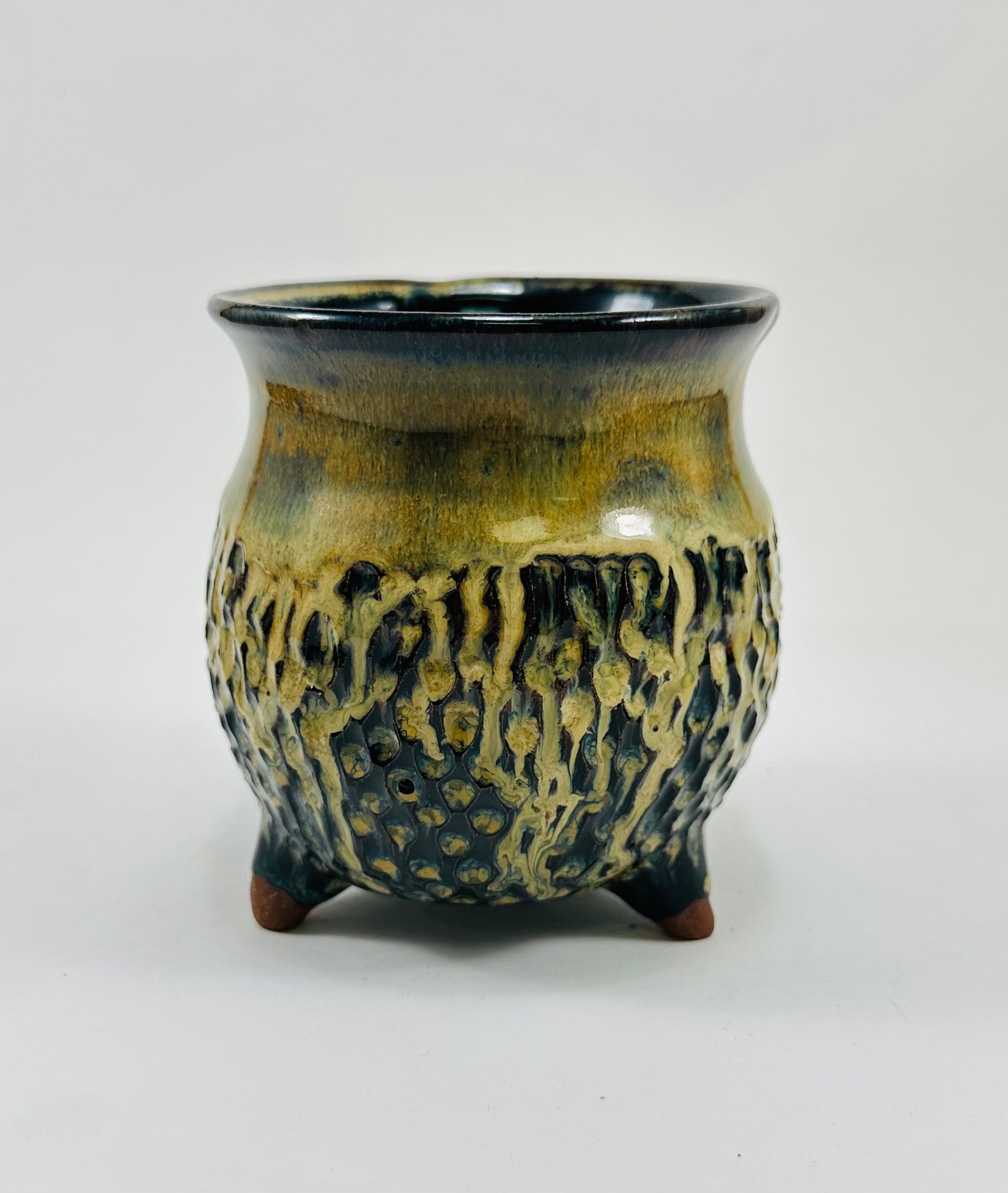 handmade ceramic cauldron in a beautiful brown and yellow glaze