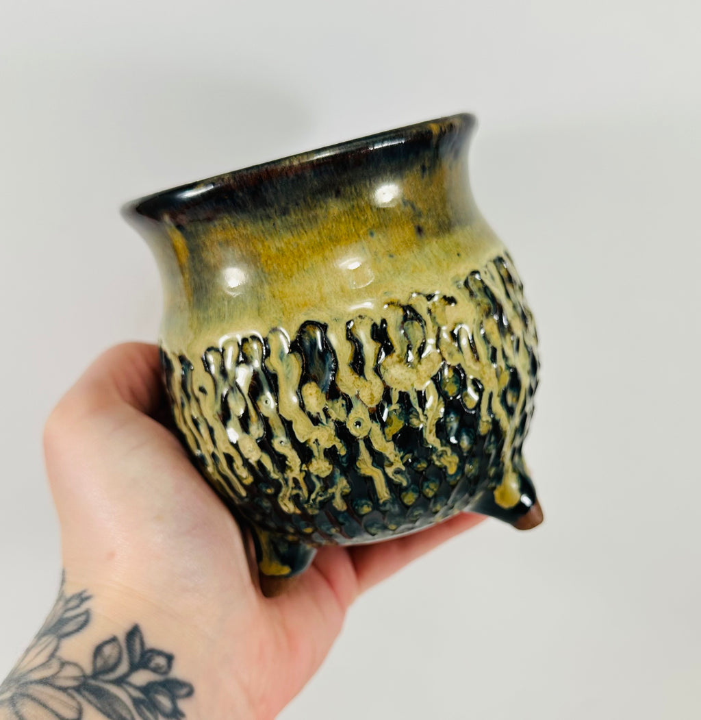 handmade ceramic cauldron in a beautiful brown and yellow glaze